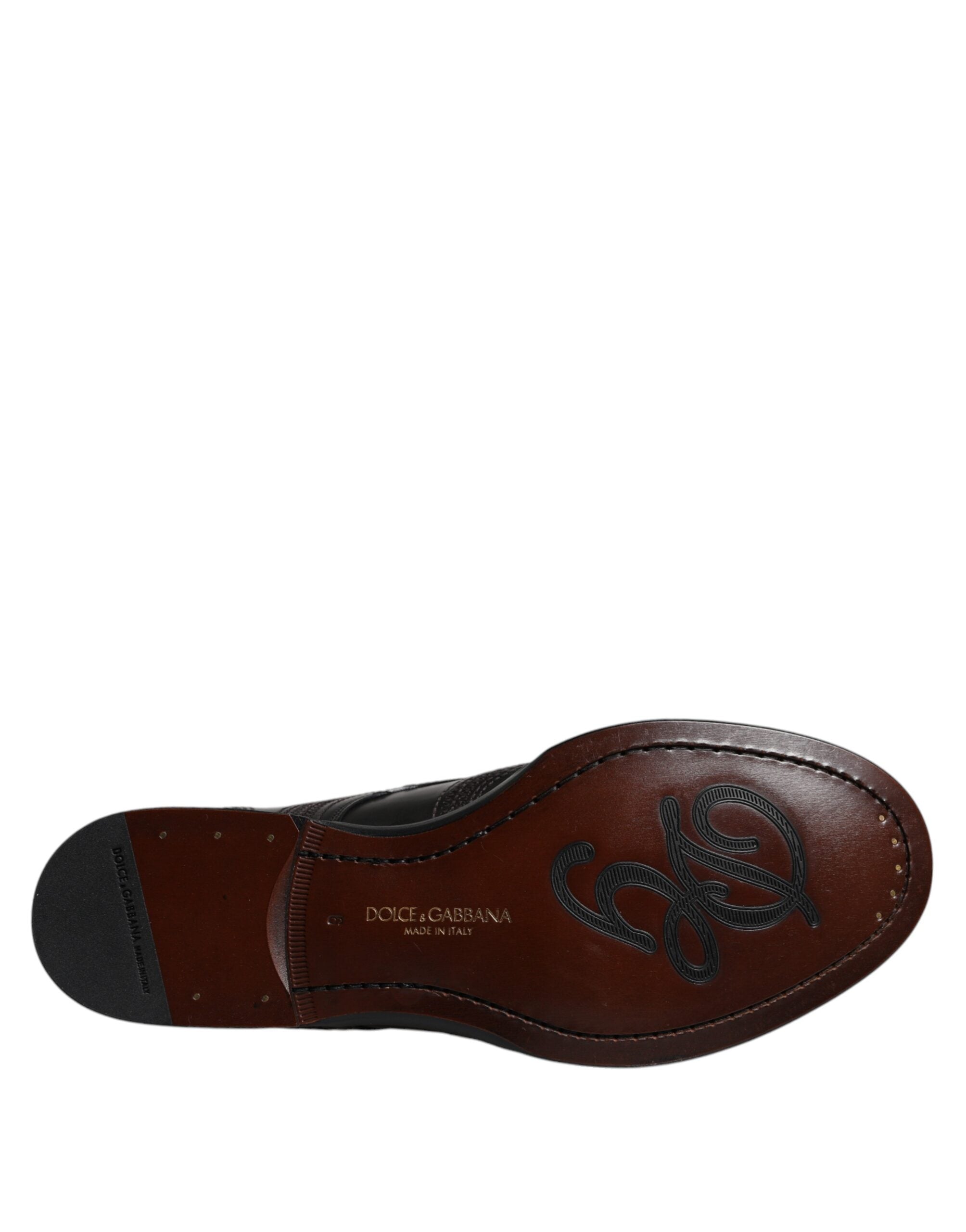 Chaussures Derby en cuir noir Dolce & Gabbana avec broderie élégante, style classique et finition de haute qualité.