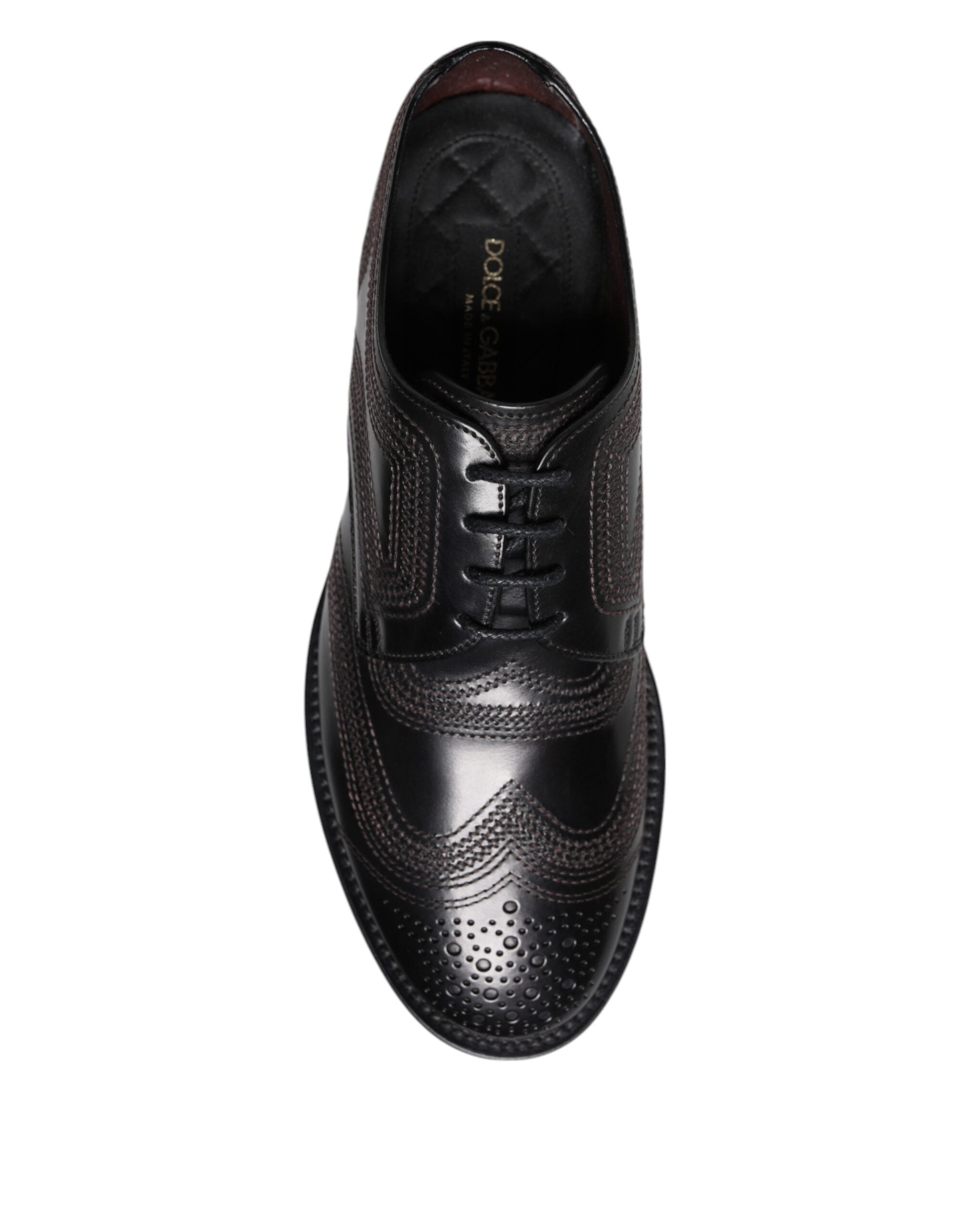 Chaussures derby en cuir noir Dolce & Gabbana, classiques avec broderies élégantes et détails sophistiqués.