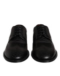 Chaussures derby en cuir noir Dolce & Gabbana, ornées de broderies classiques, élégantes et sophistiquées.