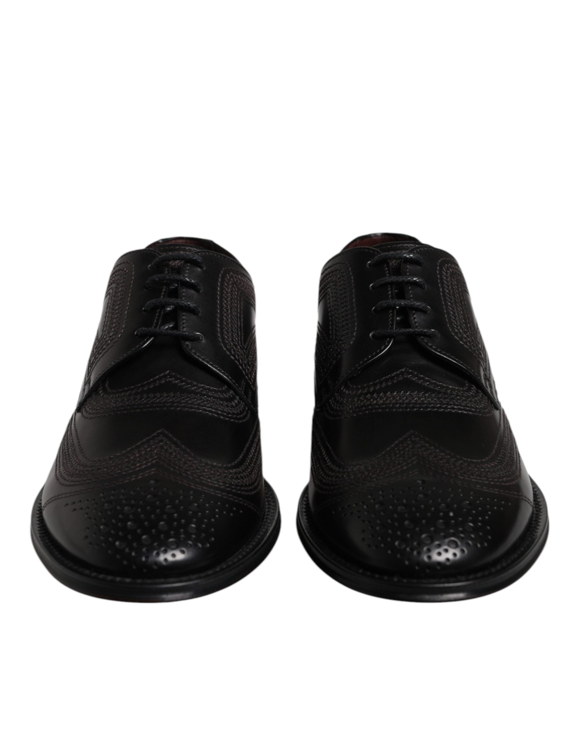 Chaussures derby en cuir noir Dolce & Gabbana, ornées de broderies classiques, élégantes et sophistiquées.