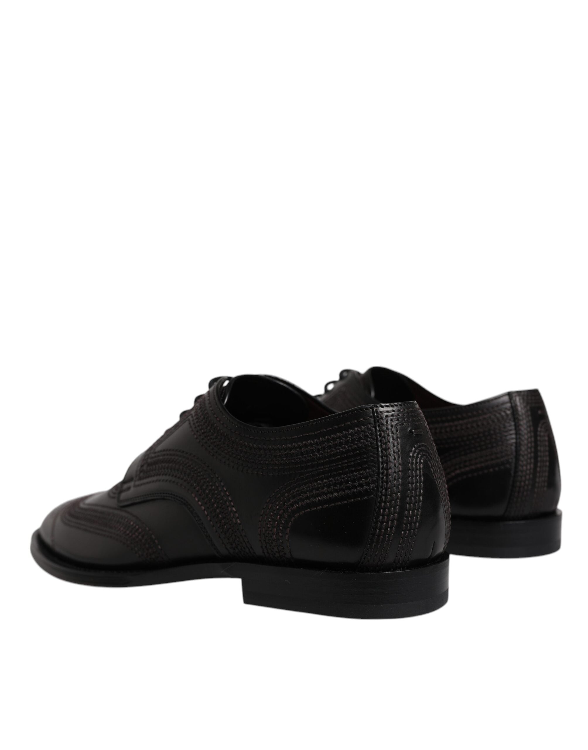 Chaussures Derby en cuir noir Dolce & Gabbana avec broderies élégantes, style classique pour homme.