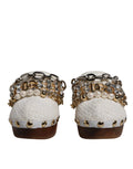 Sandales Dolce & Gabbana en raffia blanche avec chaîne bijoux, style clog élégant et sophistiqué pour femmes.