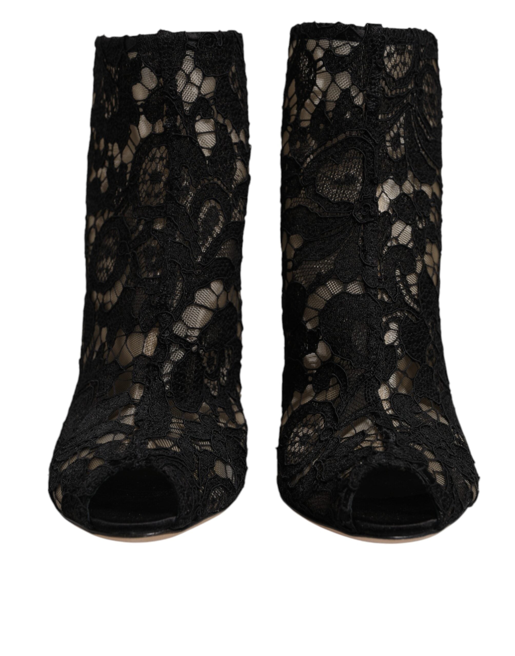 Chaussures à talons noires Dolce & Gabbana, bottines en dentelle florale, avec talon et fermeture à laçage.
