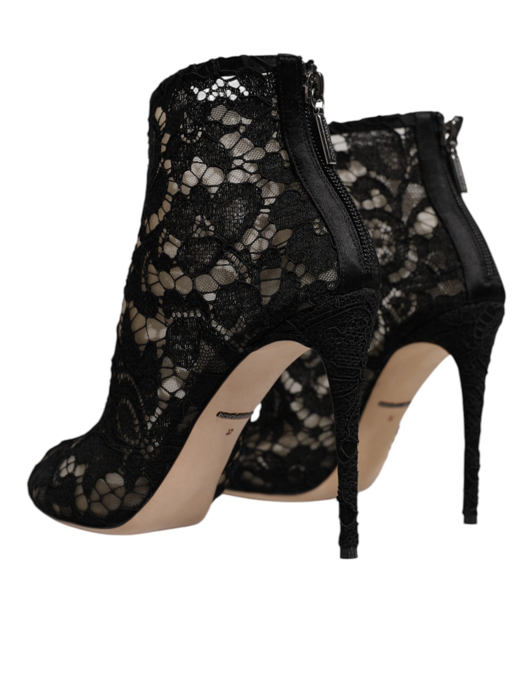 Escarpins à talons noirs en dentelle florale Dolce & Gabbana avec détails de chaussures à la cheville.