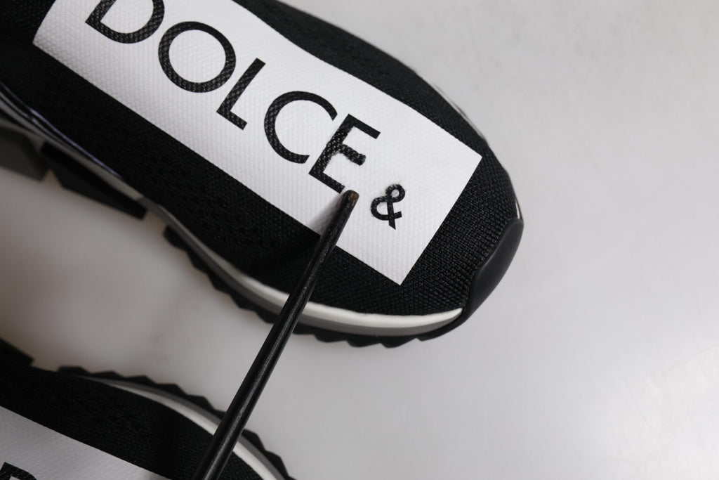 Chaussures Dolce & Gabbana Sorrento noires et blanches, sneakers slip-on pour homme, vue de face.