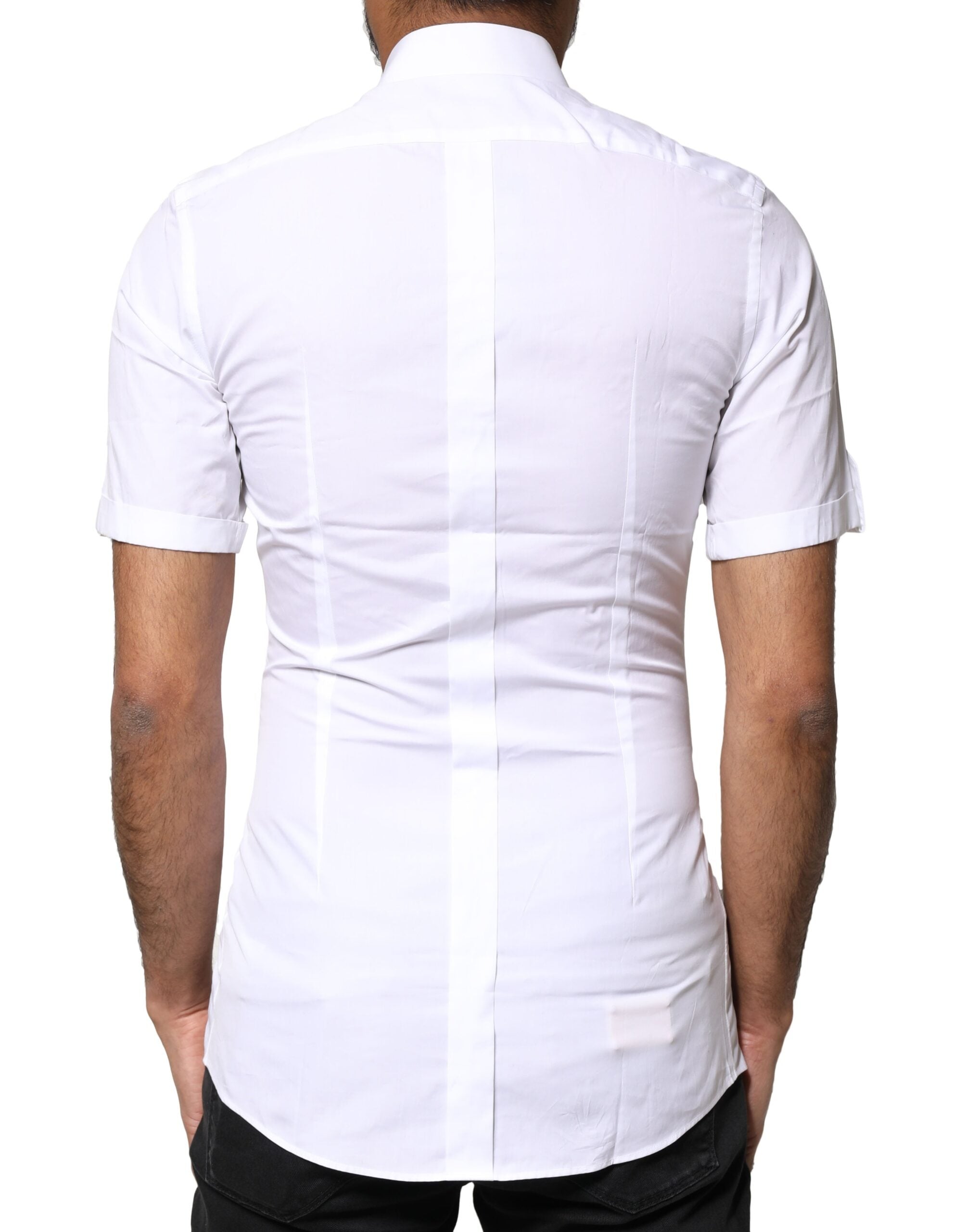 Chemise polo décontractée blanche Dolce & Gabbana avec boutons dorés pour homme, vue de devant.