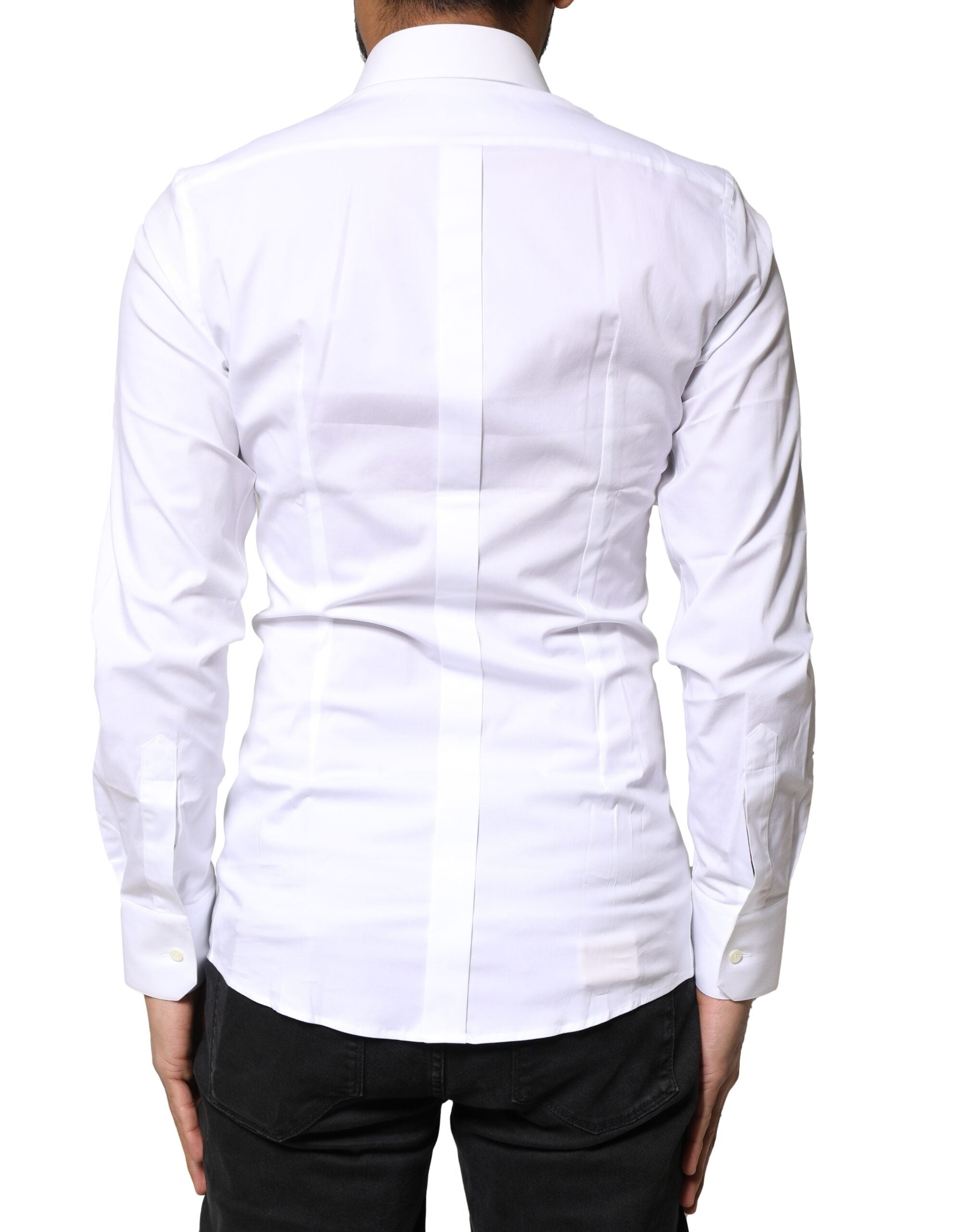 Chemise blanche Dolce & Gabbana en coton à manches longues avec détails dorés, élégante et sophistiquée.