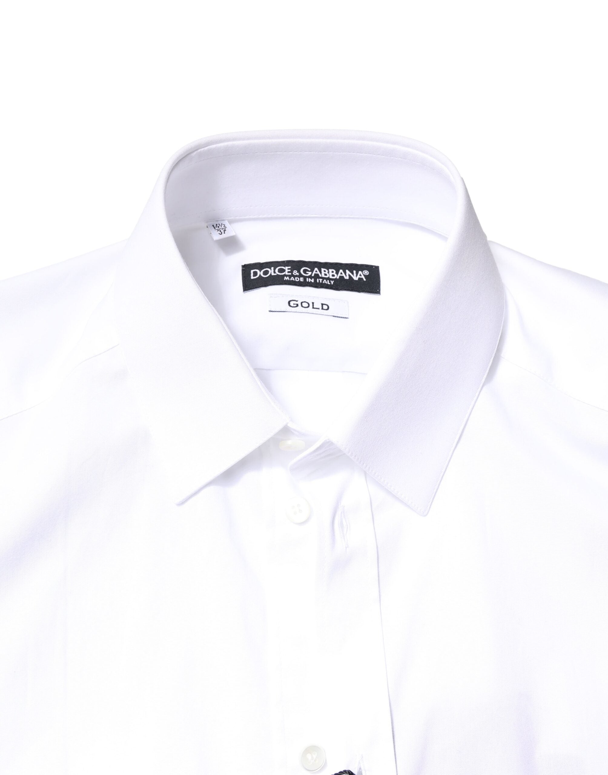 Chemise blanche en coton à manches longues Dolce & Gabbana avec détails dorés, élégante et sophistiquée.