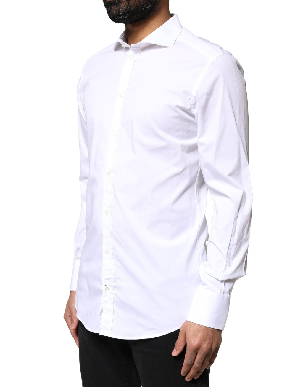 Chemise longue blanche en coton Dolce & Gabbana avec manches longues et détails dorés, élégante et sophistiquée.