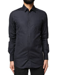 Chemise longue en coton bleu foncé avec boutons dorés de Dolce & Gabbana, manches longues, style élégant et sophistiqué.
