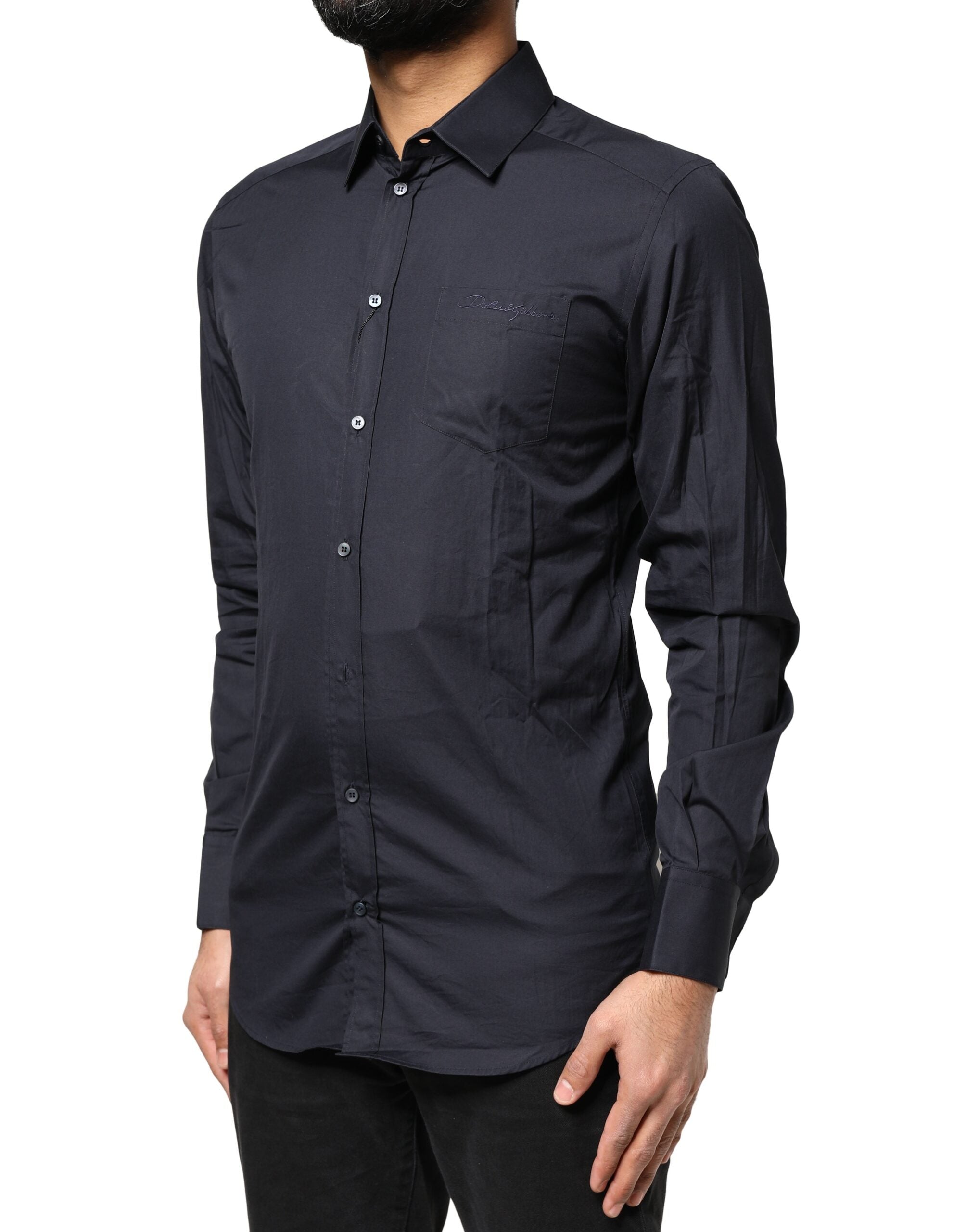 Chemise longue Dolce & Gabbana en coton bleu foncé avec manches longues et détails dorés.