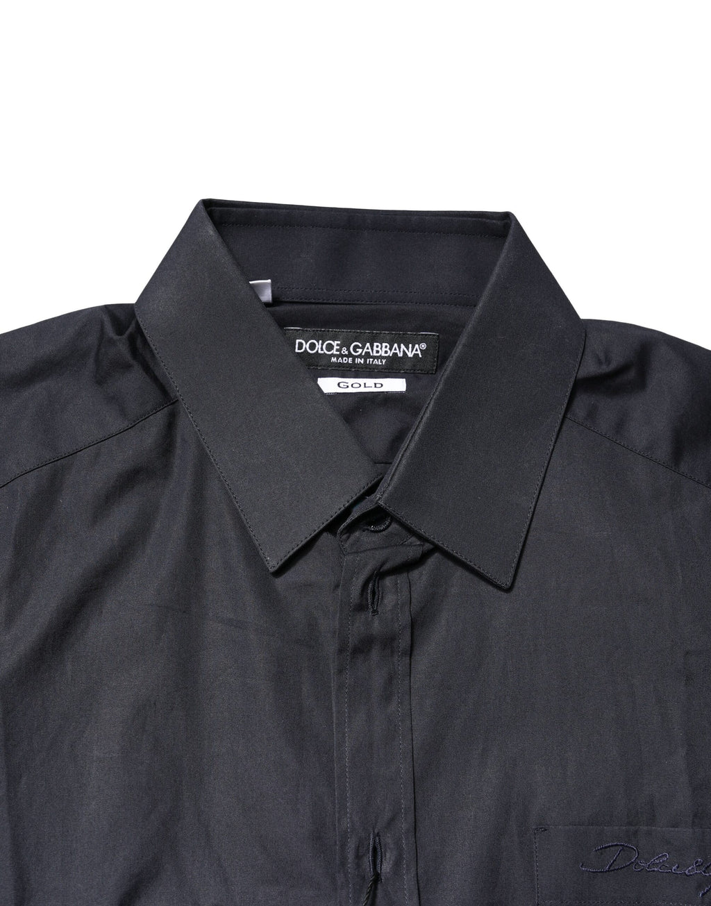 Chemise longue Dolce & Gabbana en coton bleu foncé avec détails dorés à manches longues, élégante et sophistiquée.