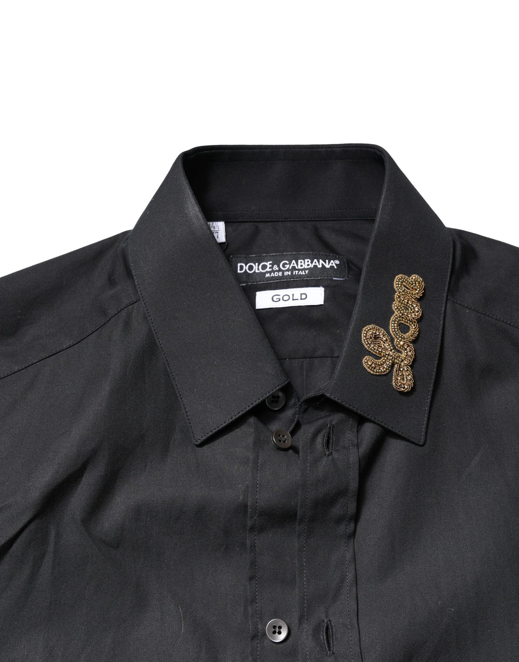 Chemise formelle noire Dolce & Gabbana avec broderie Love dorée, détails élégants et design sophistiqué visible sur l'image.
