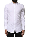 Chemise homme Dolce & Gabbana en coton blanc à manches longues avec détails dorés, élégante et sophistiquée.