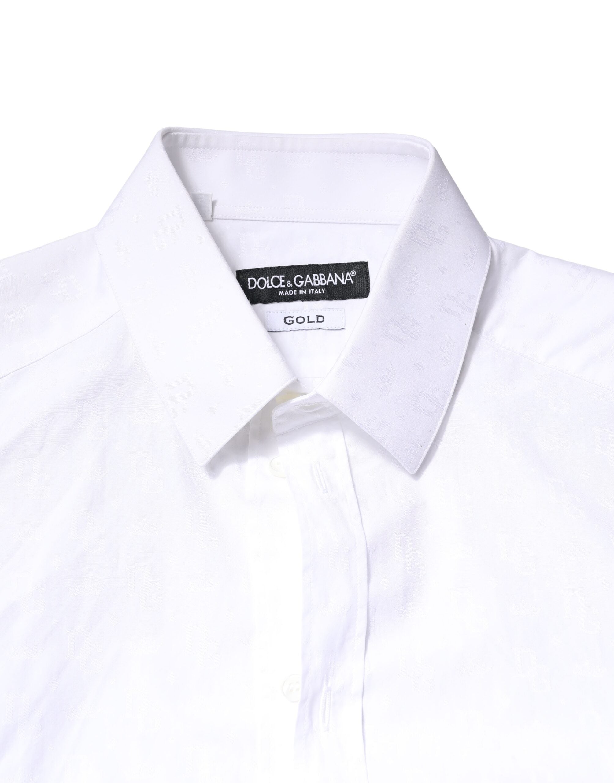 Chemise blanche en coton Dolce & Gabbana à manches longues avec détails dorés, élégante et sophistiquée.