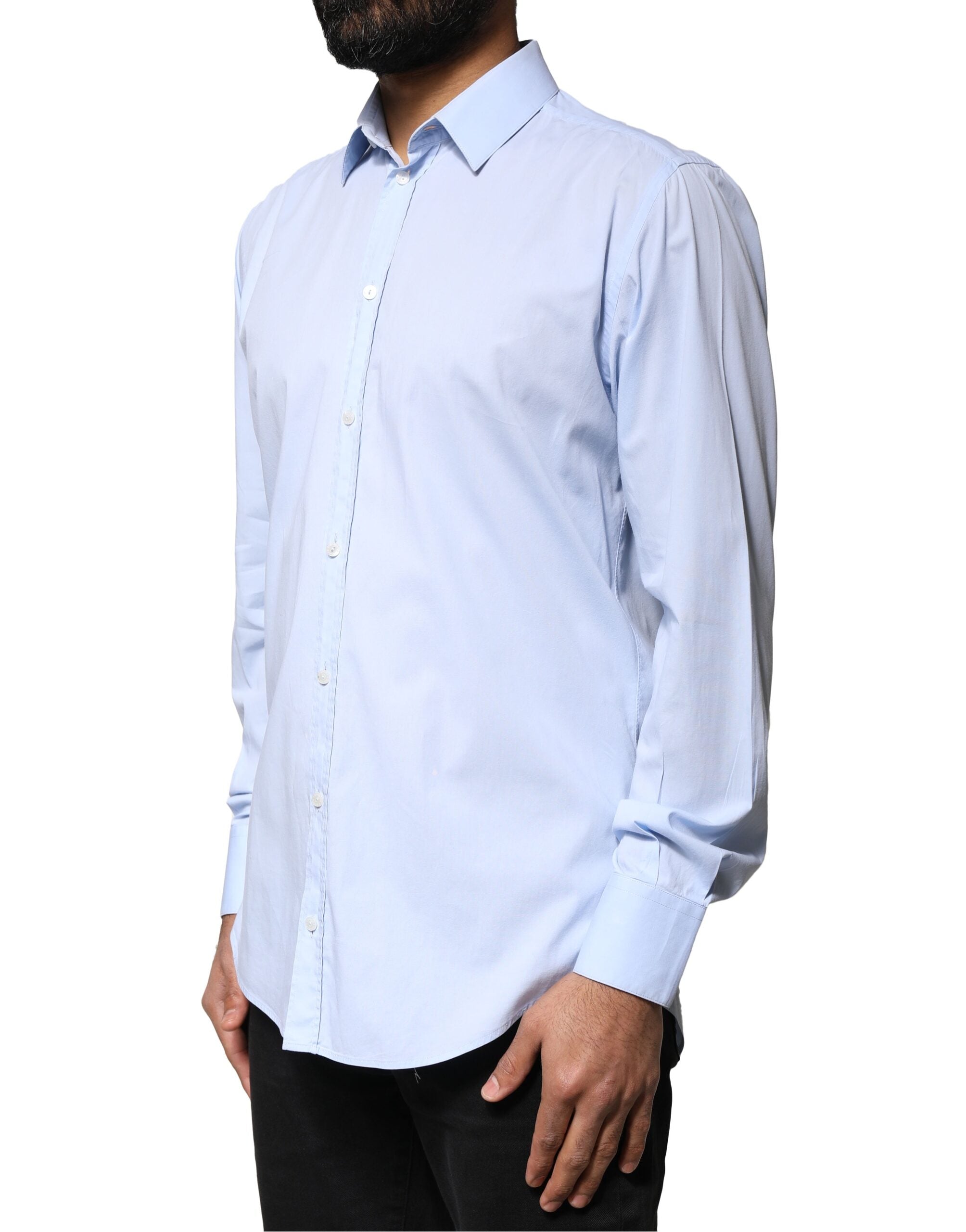 Chemise formelle en coton Dolce & Gabbana Light Blue Martini avec col classique et boutons blancs sur fond blanc.