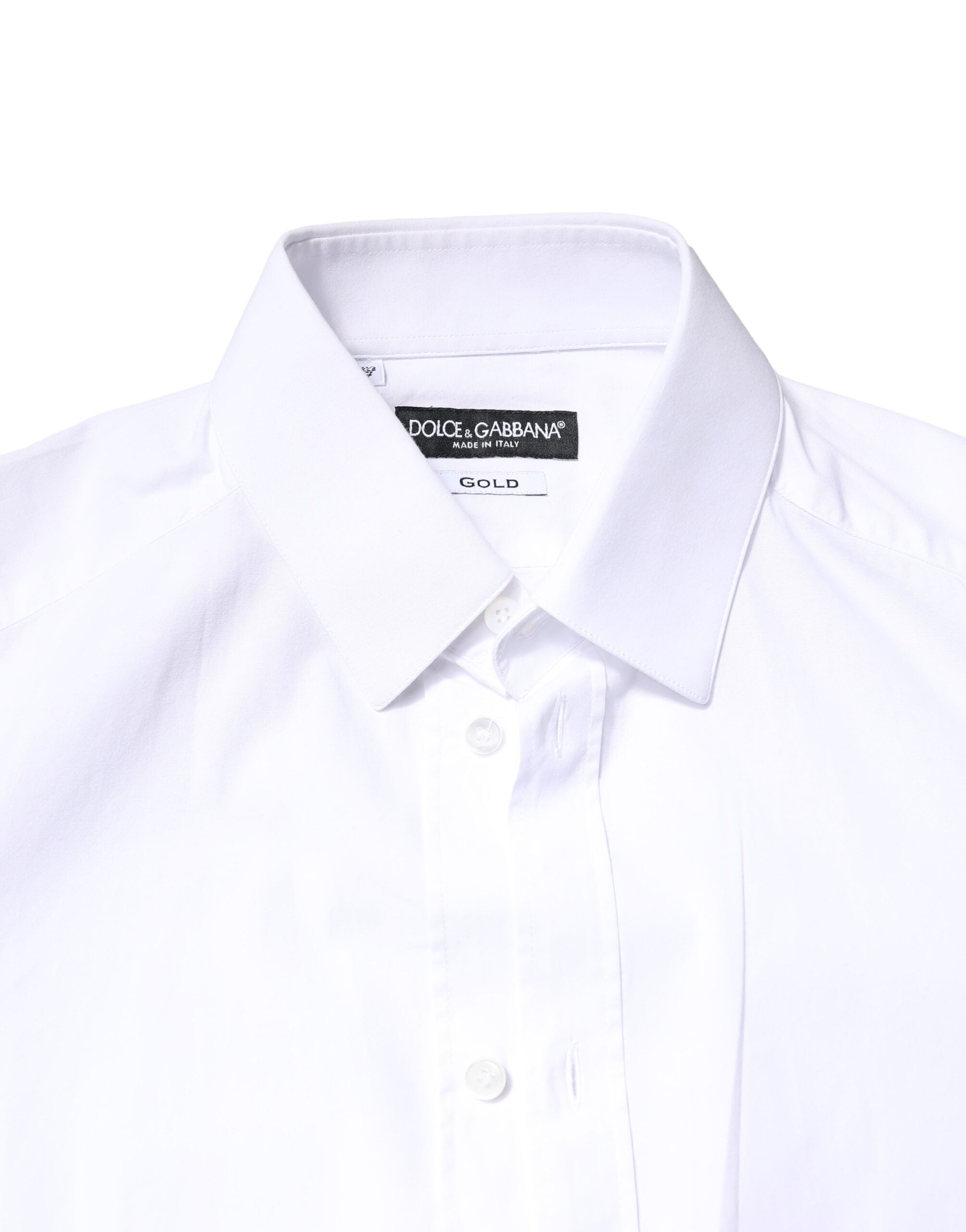 Chemise blanche à manches longues en coton Dolce & Gabbana avec détails dorés, élégante et sophistiquée.