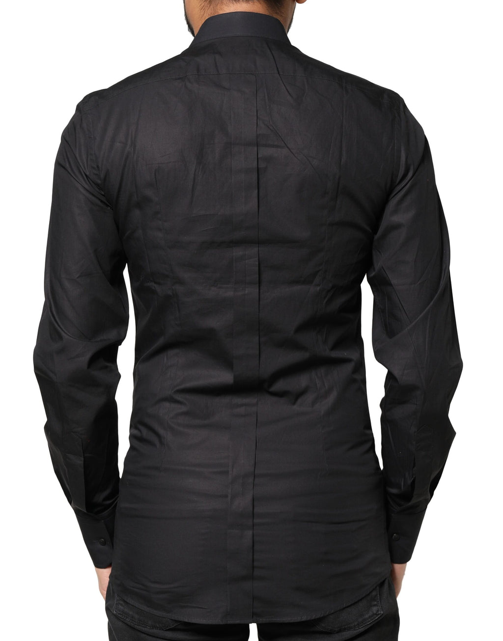 Chemise homme Dolce & Gabbana noire avec croix dorée et embellissements en or, style élégant et sophistiqué.