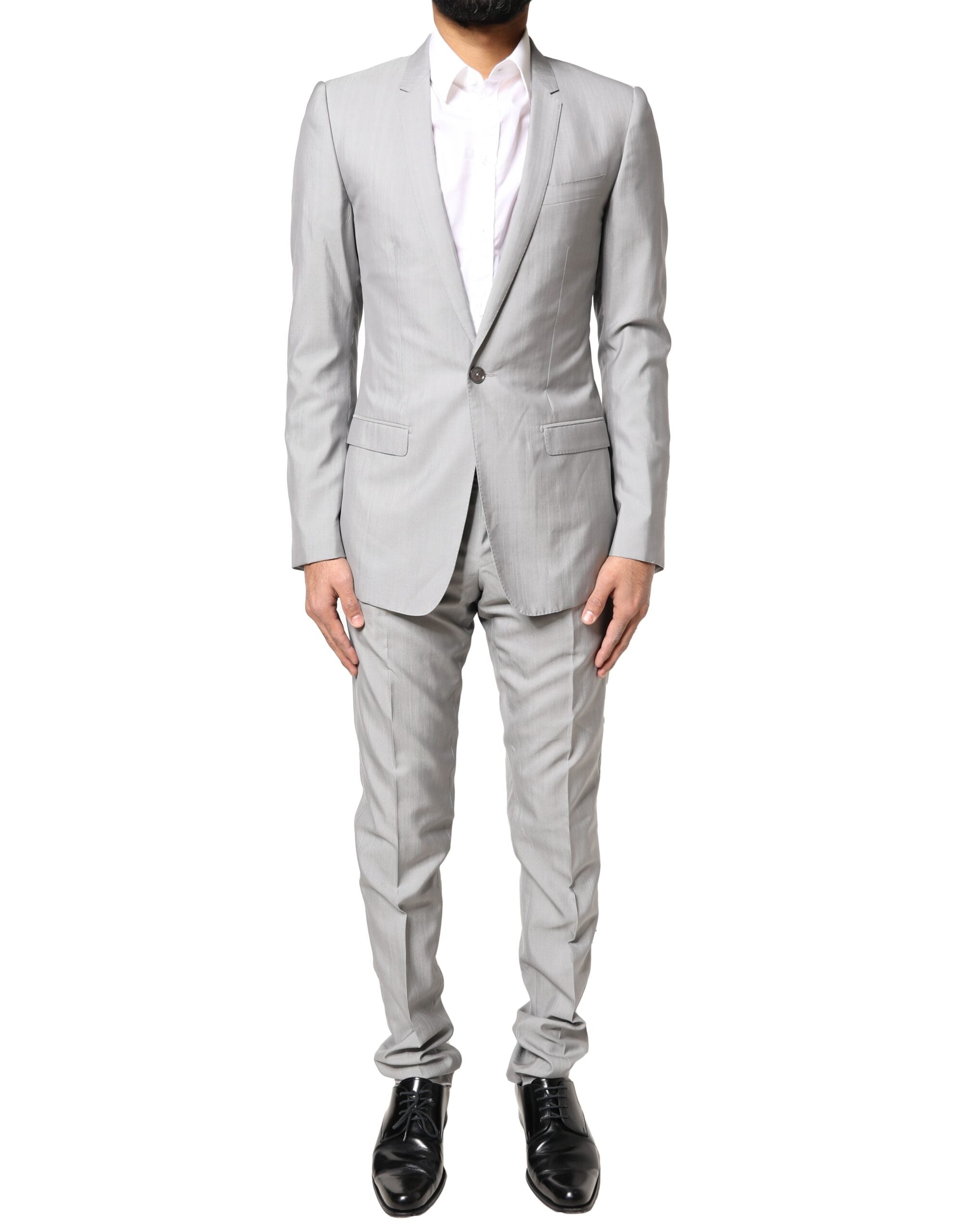 Costume formel en laine gris clair Dolce & Gabbana, ensemble 2 pièces avec détails dorés pour homme.
