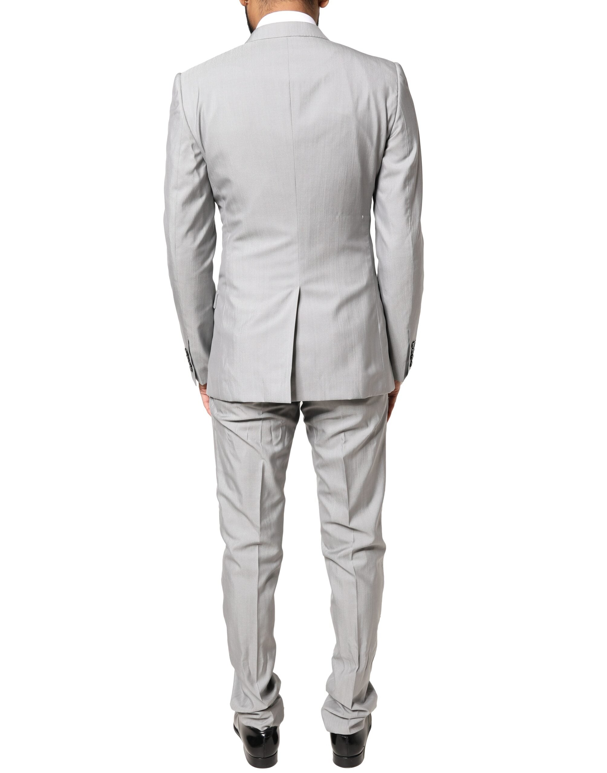 Costume formel en laine gris clair Dolce & Gabbana avec détails dorés, costume deux pièces élégant et sophistiqué.