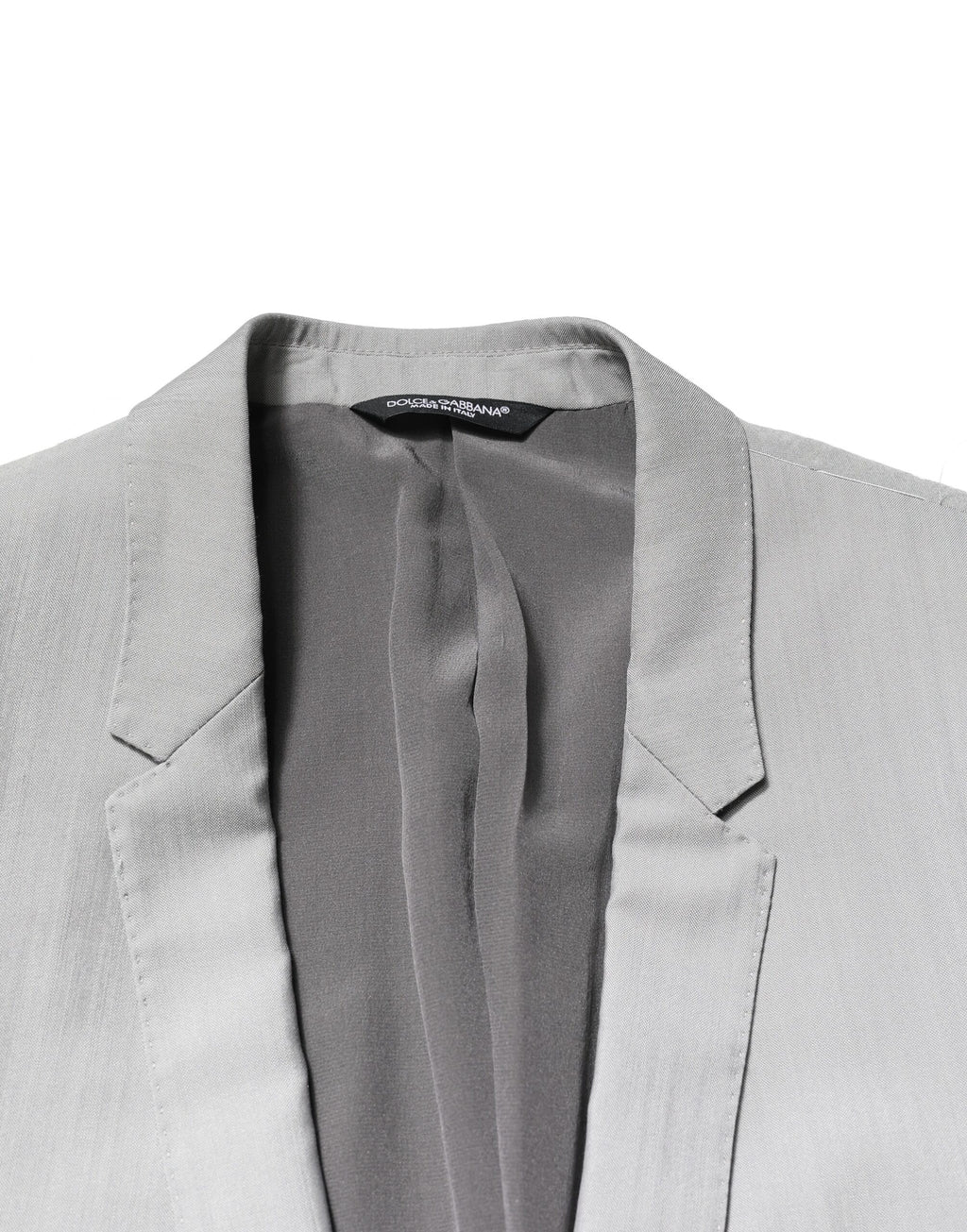 Costume deux pièces en laine gris clair Dolce & Gabbana, élégant et formel, avec détails en or, pour homme.