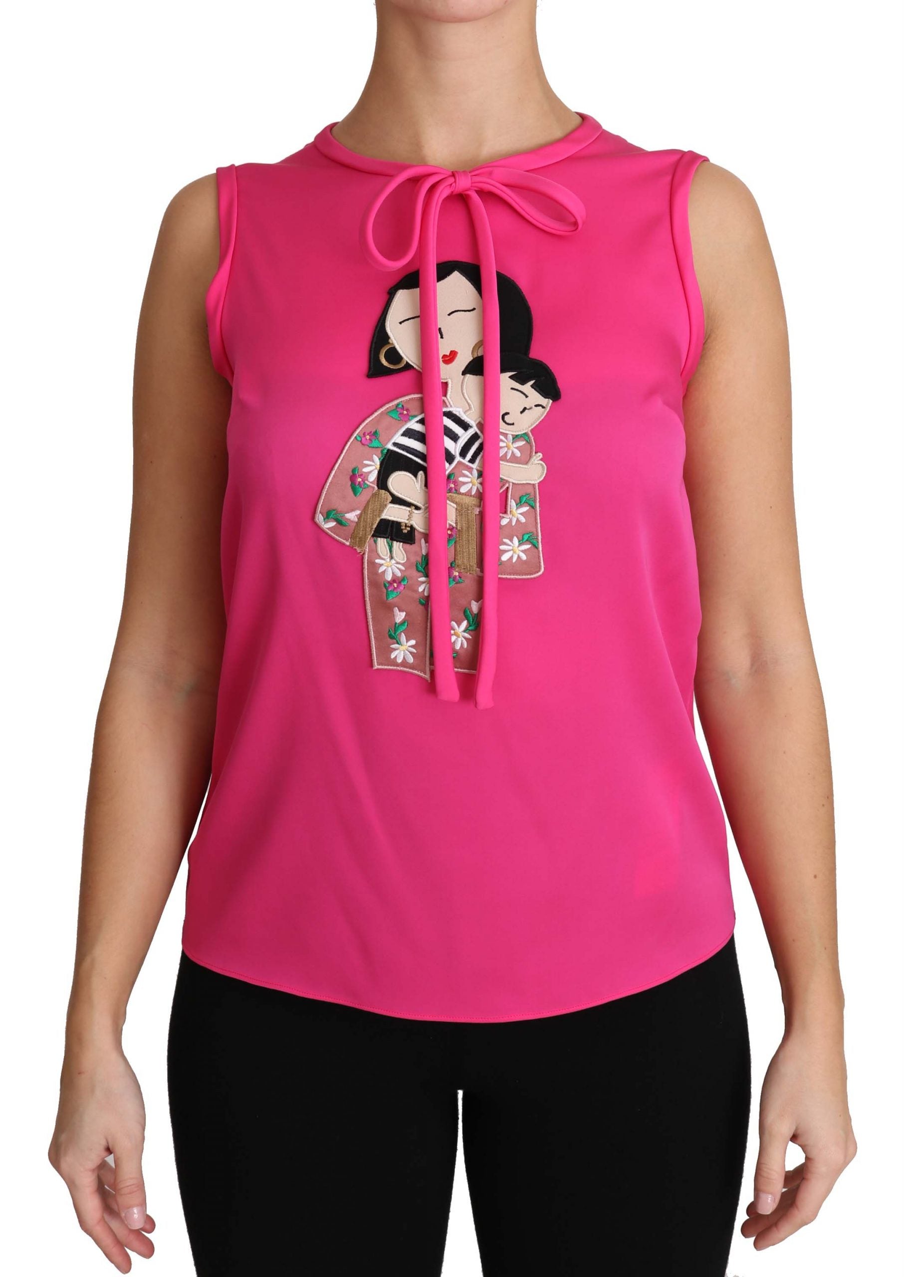 Blouse en soie rose Dolce & Gabbana pour femme, coupe fluide et élégante, avec manches courtes et col classique.