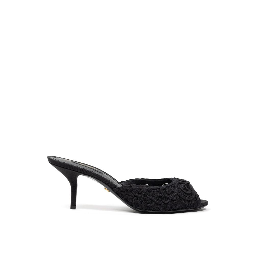 Mules en coton noirs Dolce & Gabbana, élégantes chaussures décontractées pour femmes, avec design sophistiqué et confort.