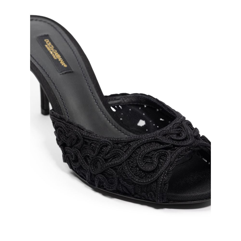 Mules en coton noir de Dolce & Gabbana, élégants et confortables, avec design sophistiqué pour femmes.