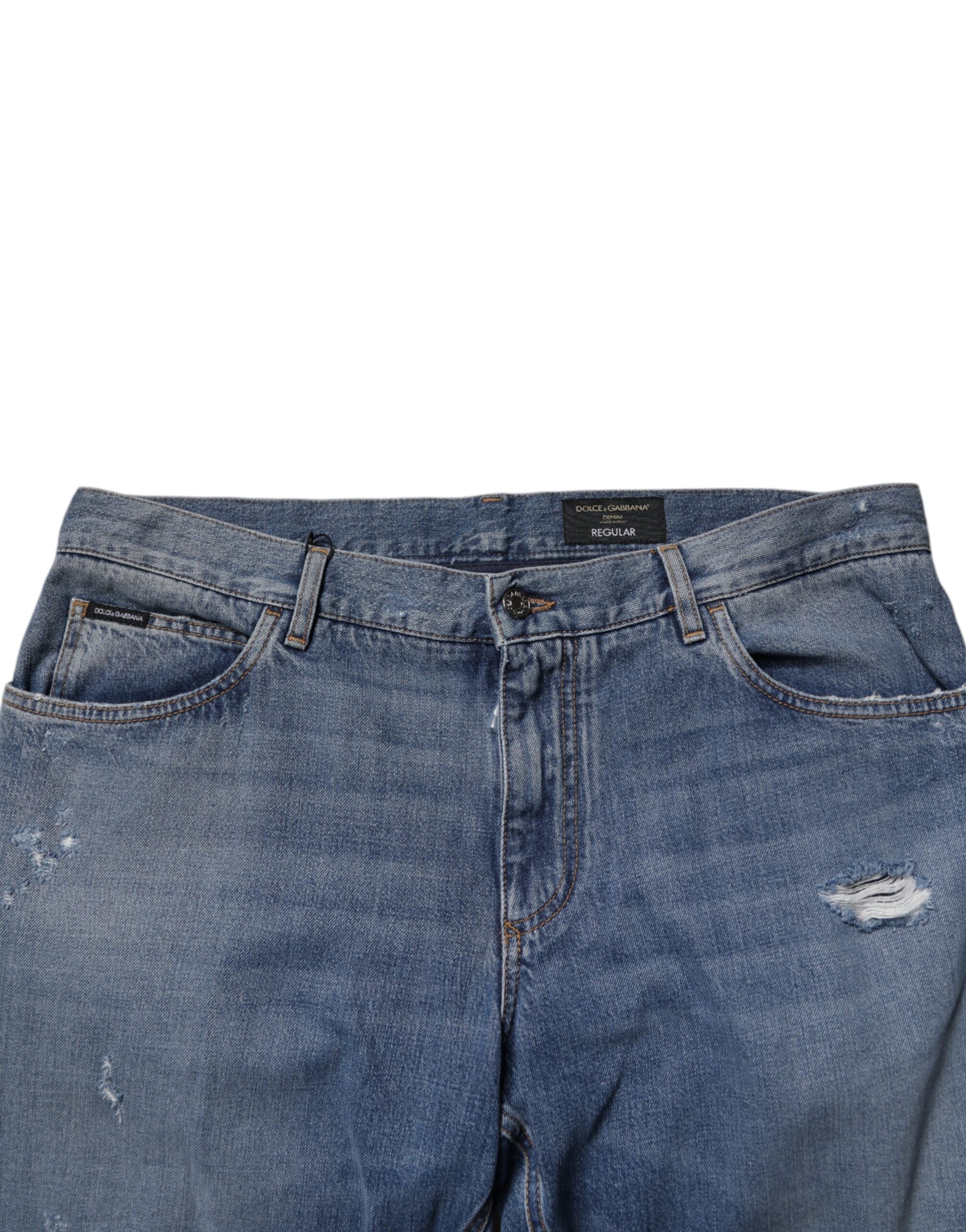 Jeans droits en denim blanc déchiré de Dolce & Gabbana, coton, style décontracté, vue de face avec détails usés.