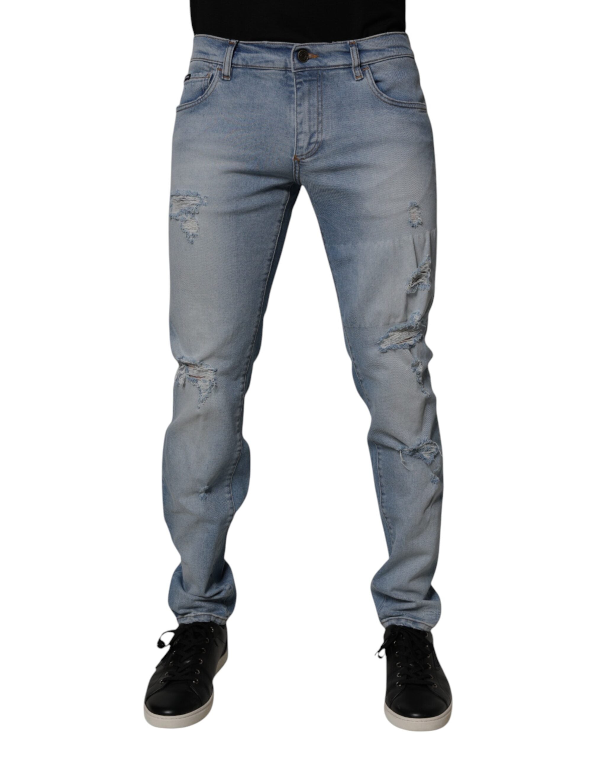 Jeans slim en denim en coton déchiré bleu de Dolce & Gabbana pour homme, style moderne et tendance.