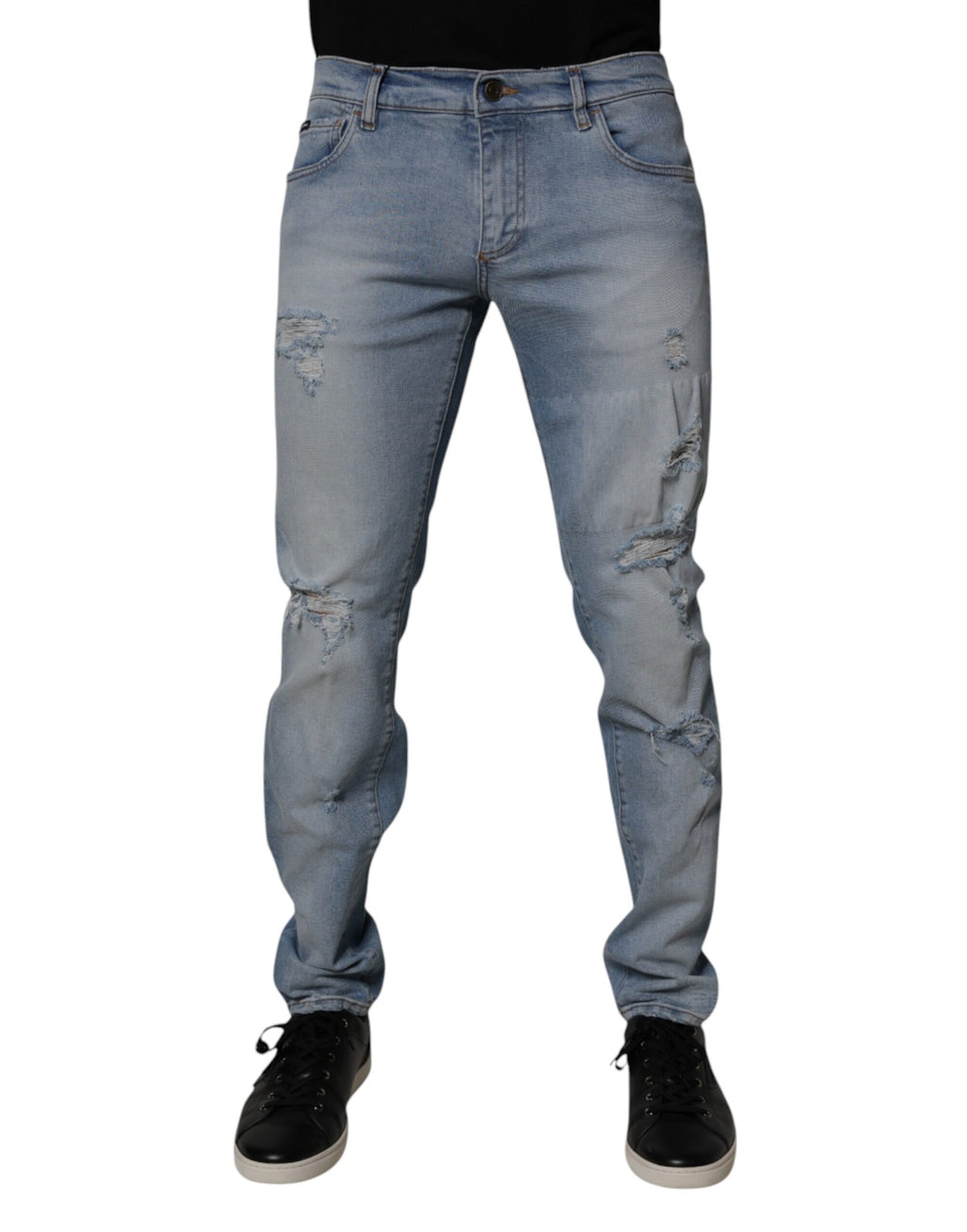 Jeans skinny en denim coton déchiré bleu de Dolce & Gabbana pour homme, coupe ajustée et détails usés.