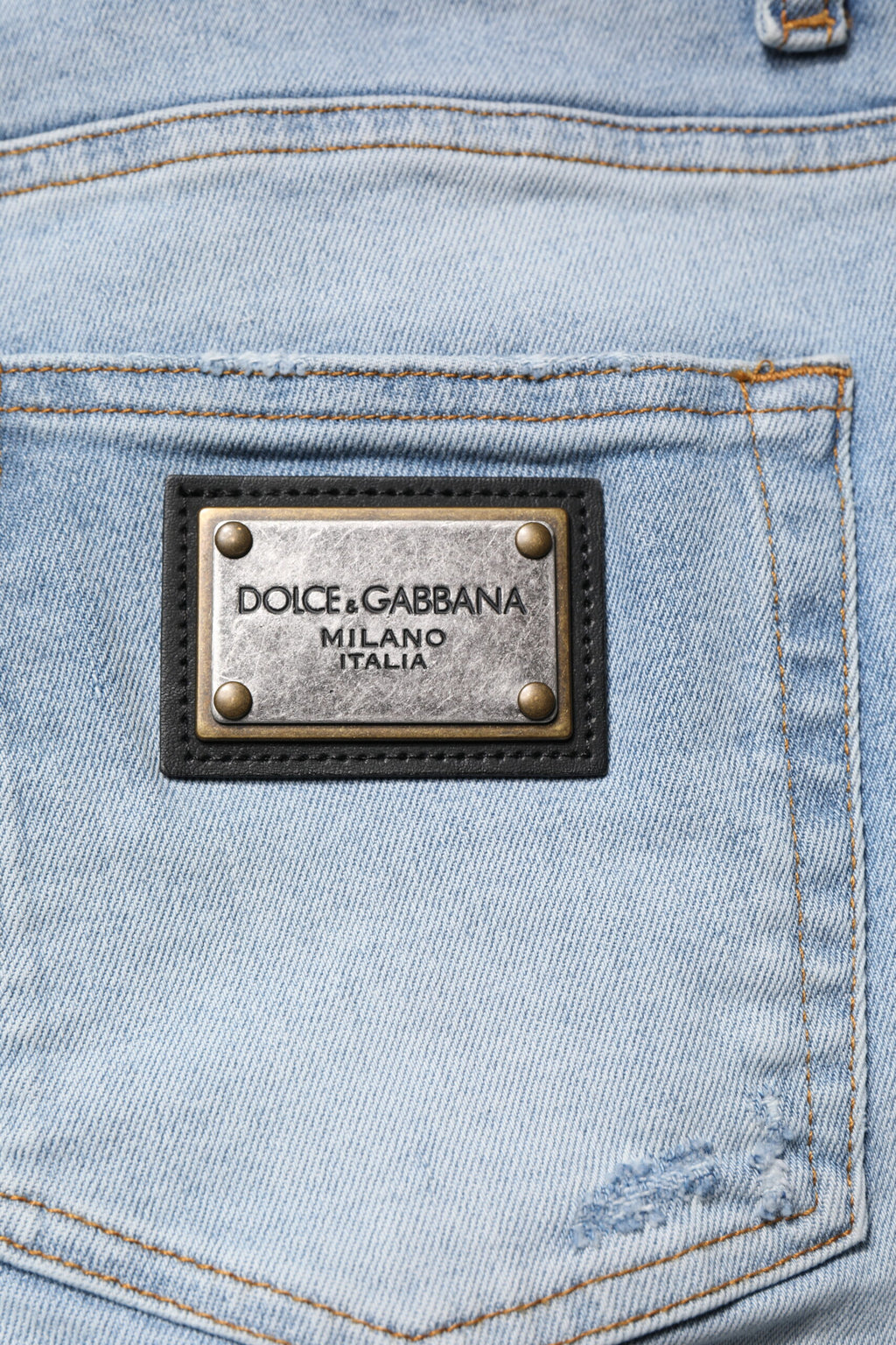 Jeans homme en denim skinny bleu déchiré de Dolce & Gabbana, coton, style décontracté et tendance.