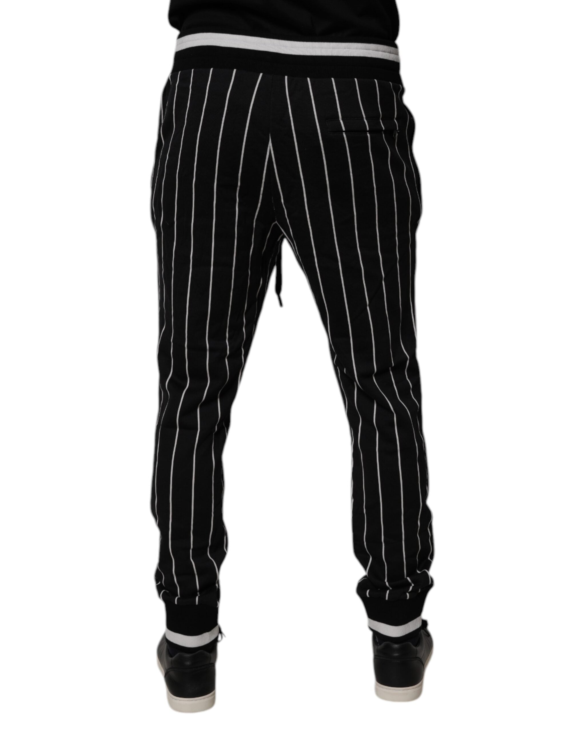 Pantalon jogging Dolce & Gabbana à rayures noires et blanches, confortable et tendance, pour femme ou homme.