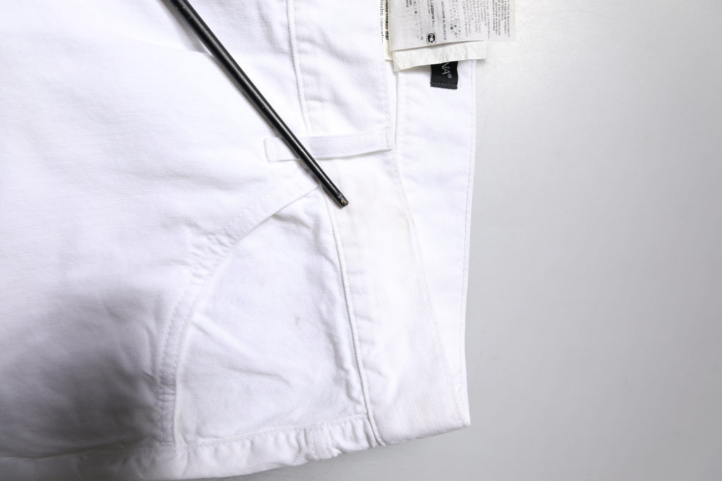 Jean droit en coton blanc pour homme de Dolce & Gabbana, style classique et coupe confortable visible sur l'image.