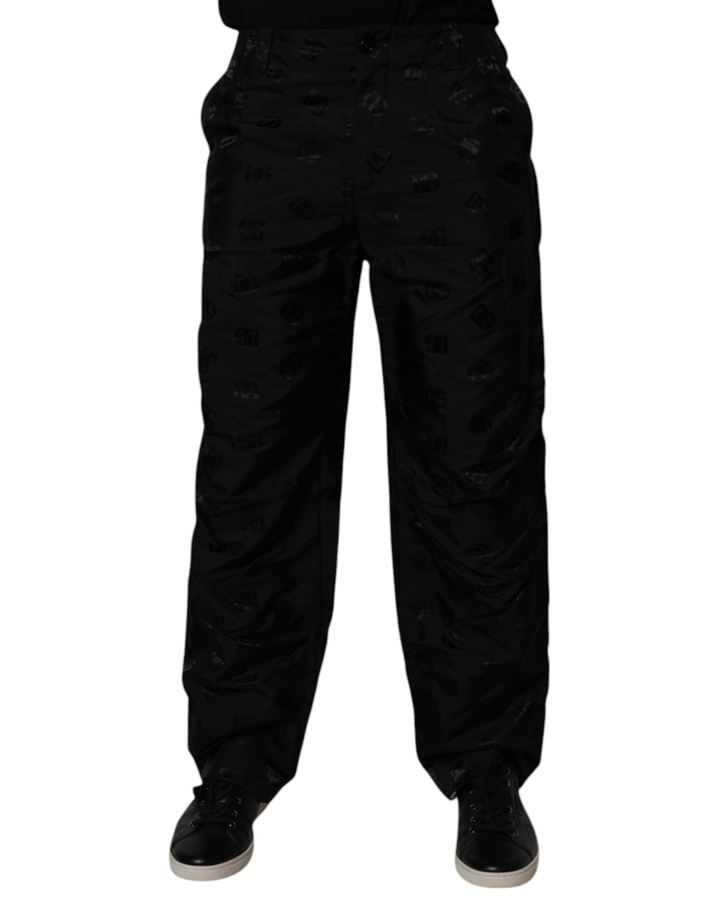 Pantalon droit noir Dolce & Gabbana avec logo monogramme, tissu élégant et coupe classique visible sur l’image.