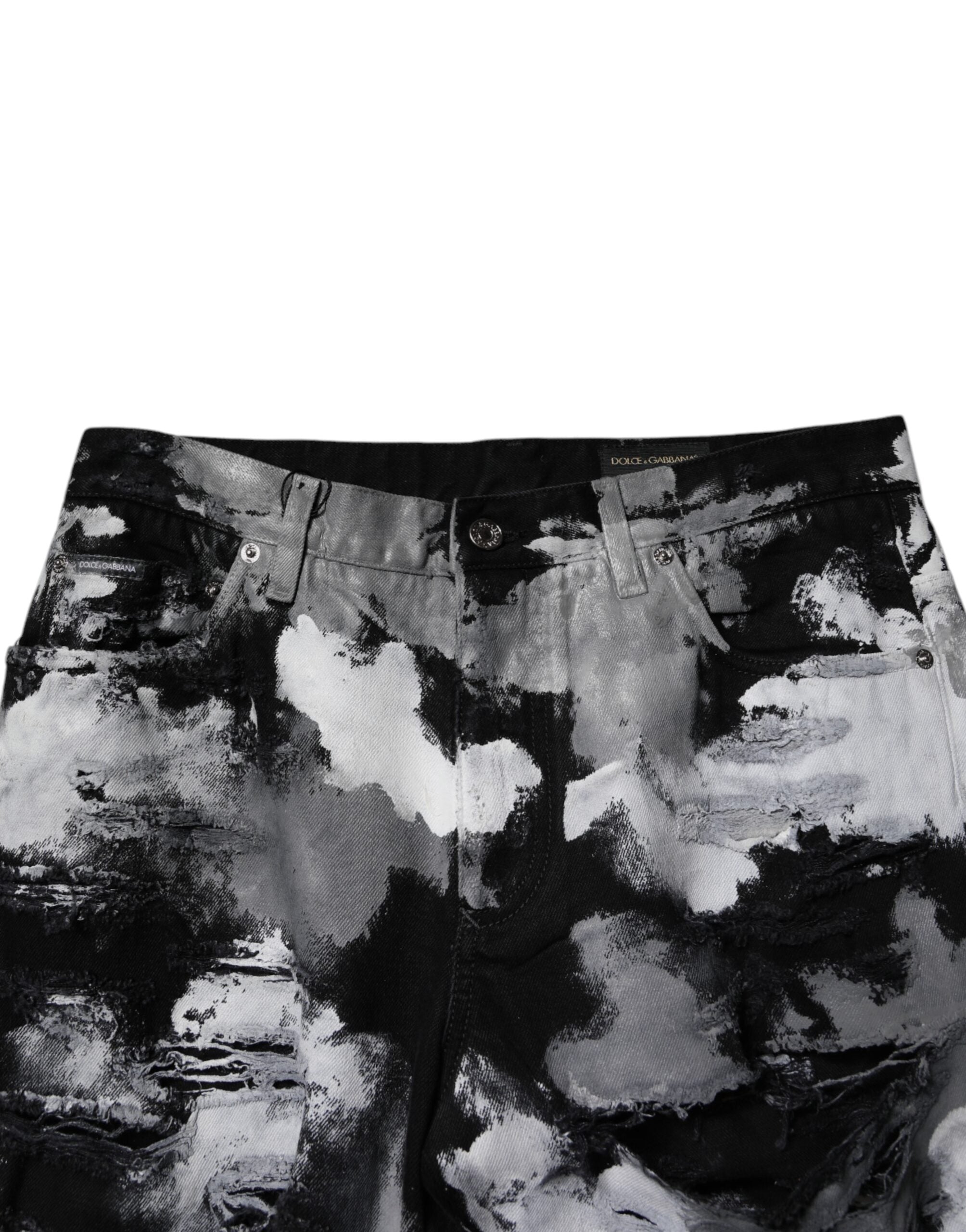 Jean skinny déchiré Dolce & Gabbana camouflage multicolore avec déchirures, denim tendance et style audacieux.