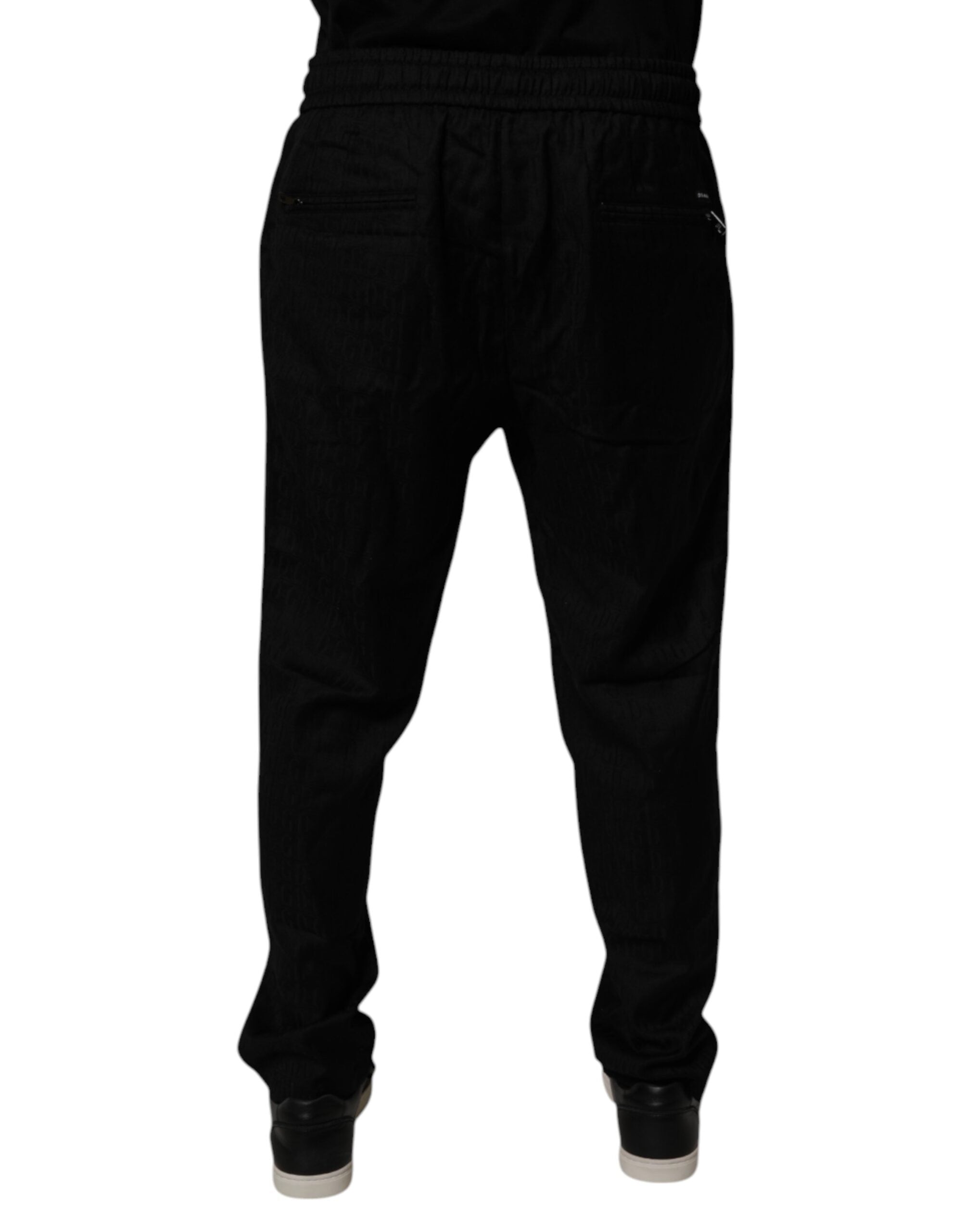 Pantalons joggers en laine noire Dolce & Gabbana, style décontracté avec coupe confortable et détails élégants.