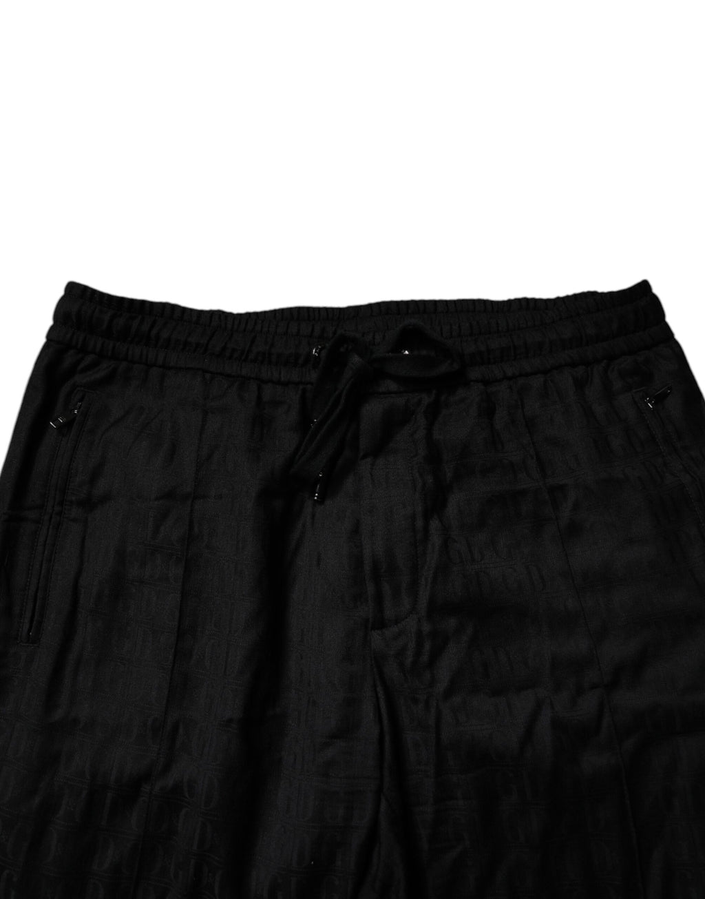 Pantalon de jogging en laine noire Dolce & Gabbana, style décontracté avec taille élastique et poches latérales.