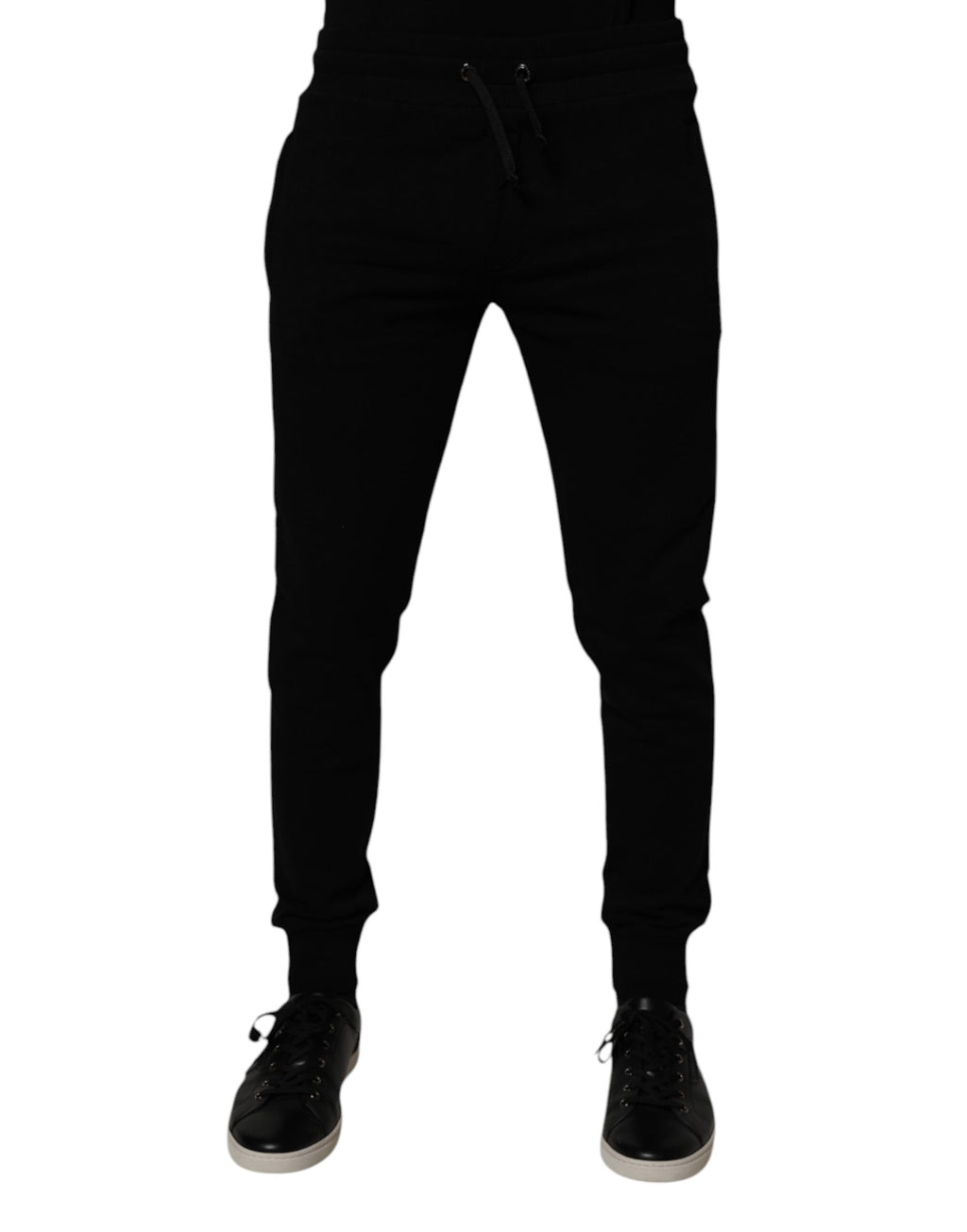 Pantalons de jogging en coton noir Dolce & Gabbana, style décontracté avec logo de la marque, vue de face.