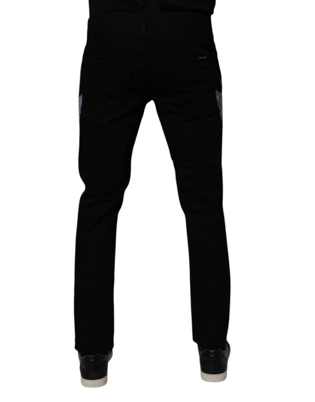 Jeans skinny en coton noir à fleurs de Dolce & Gabbana pour homme, denim avec motif floral et coupe ajustée.
