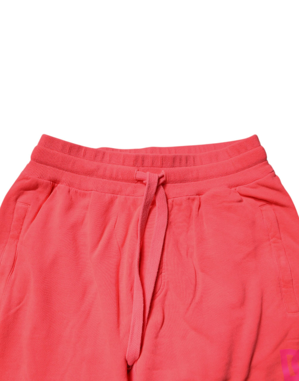 Pantalon de jogging en coton rouge néon Dolce & Gabbana pour homme, sweatpants décontractés et tendance.