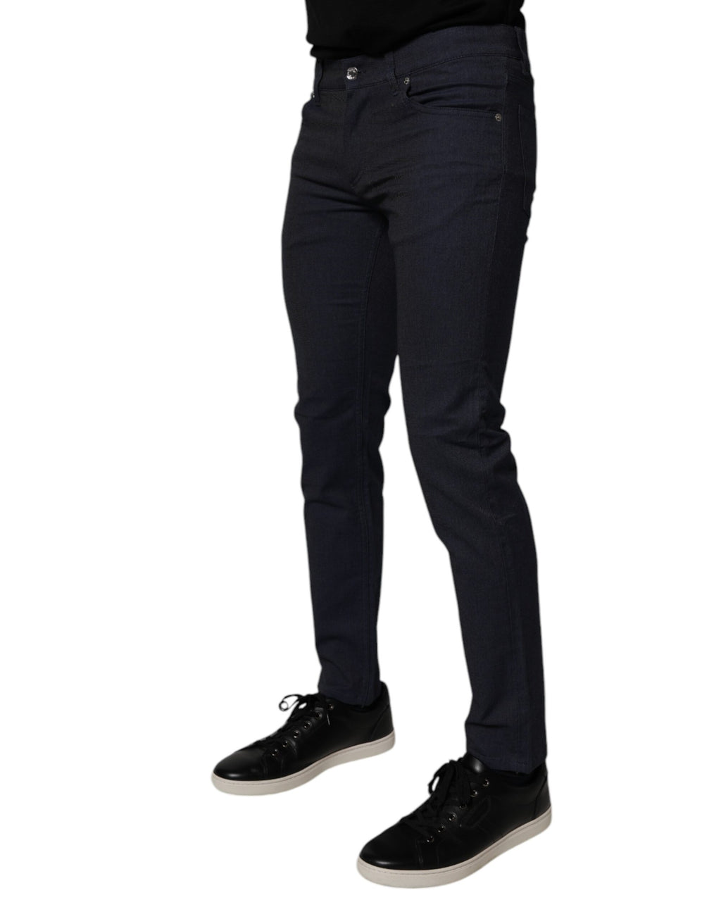Jeans slim en denim coton stretch bleu foncé de Dolce & Gabbana, style skinny, visible détails de la doublure et des coutures.
