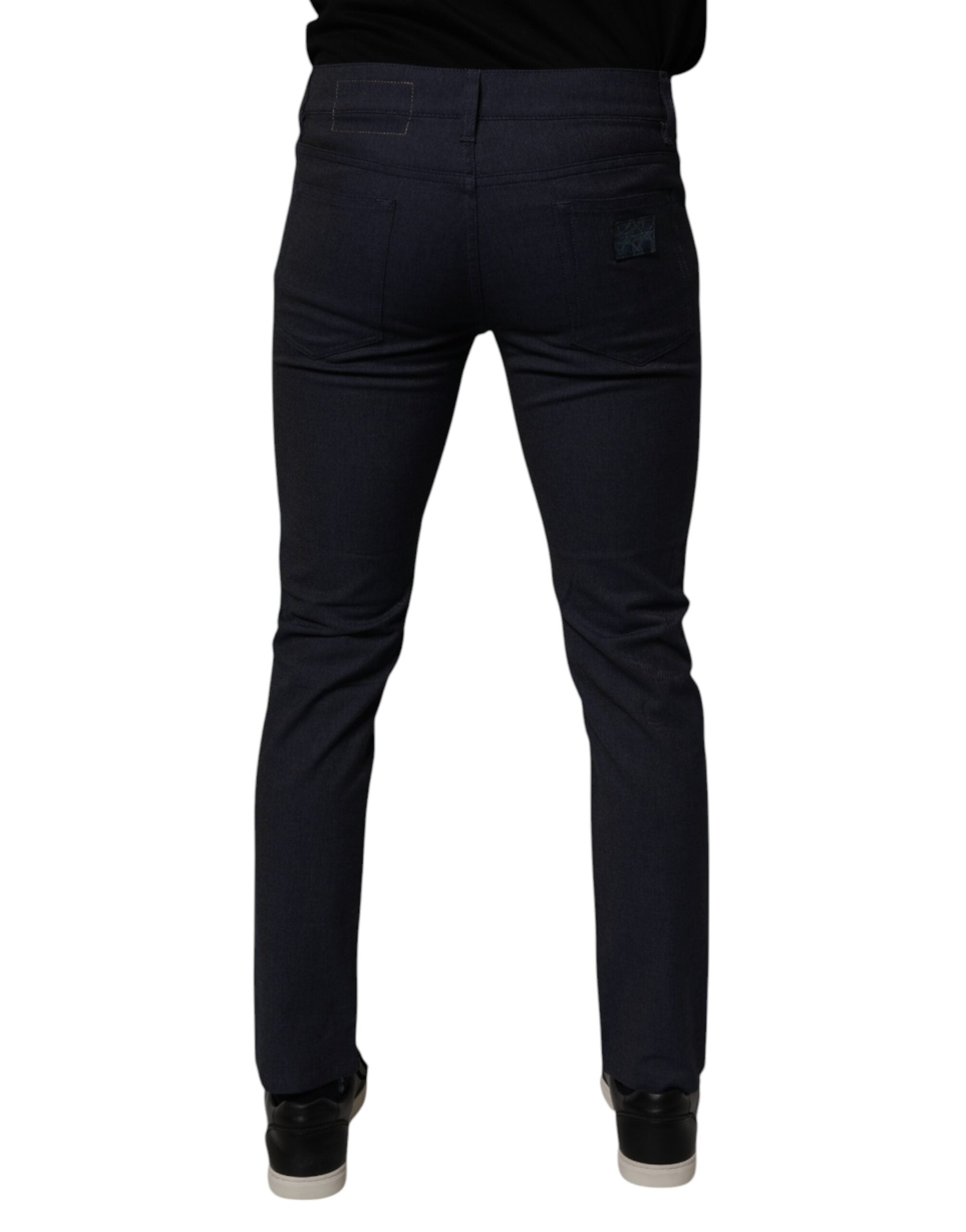 Jean skinny en denim stretch coton bleu foncé de Dolce & Gabbana, visible avec fermeture éclair et poche arrière.