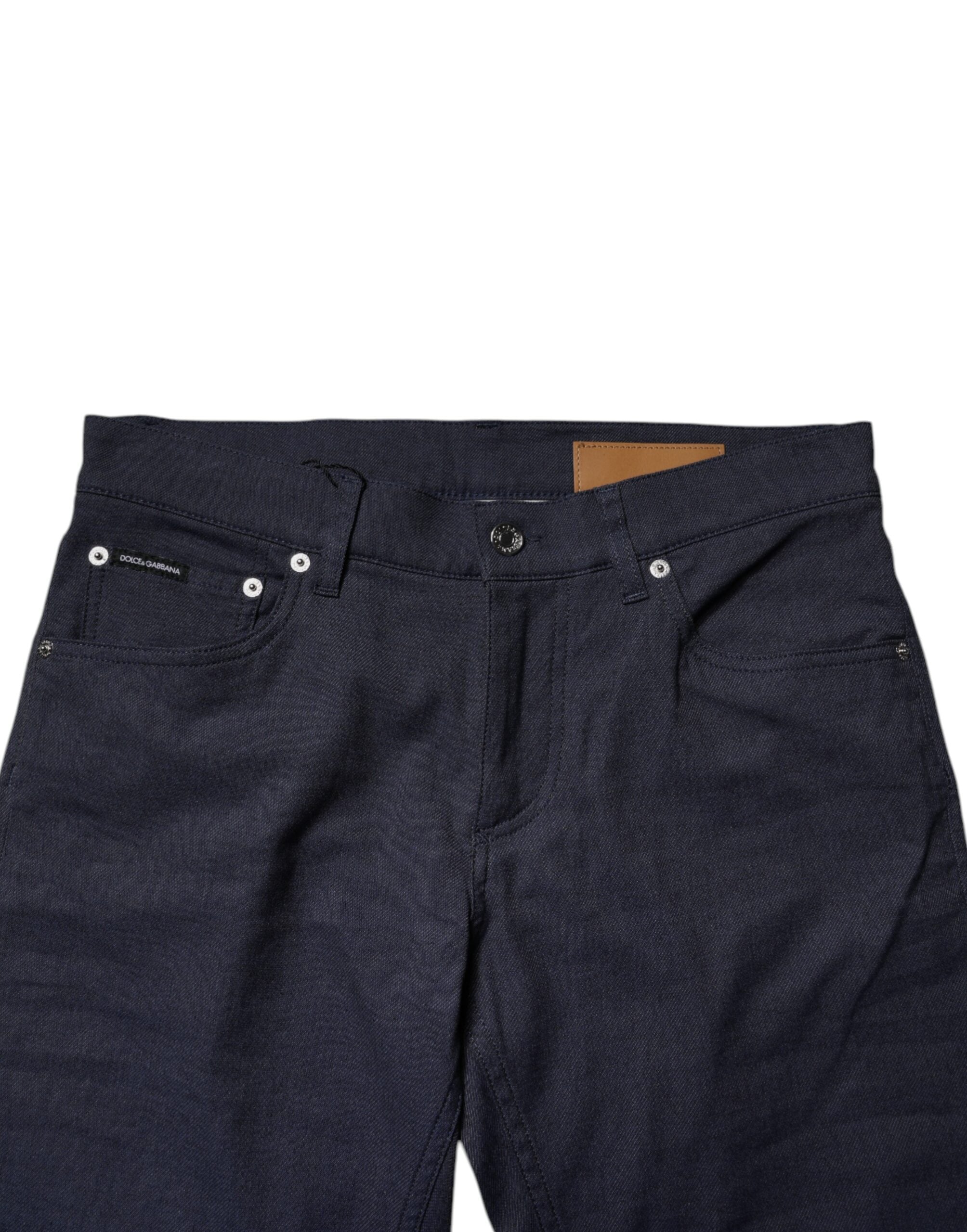 Jeans slim en denim coton stretch bleu foncé de Dolce & Gabbana, visibles avec coupe skinny et détails classiques.