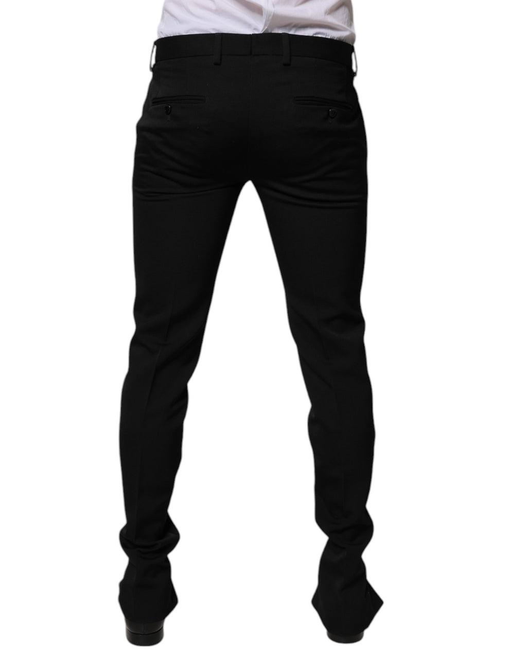Pantalon formel en laine noire Dolce & Gabbana, coupe tapered, vue de devant sur un fond blanc.