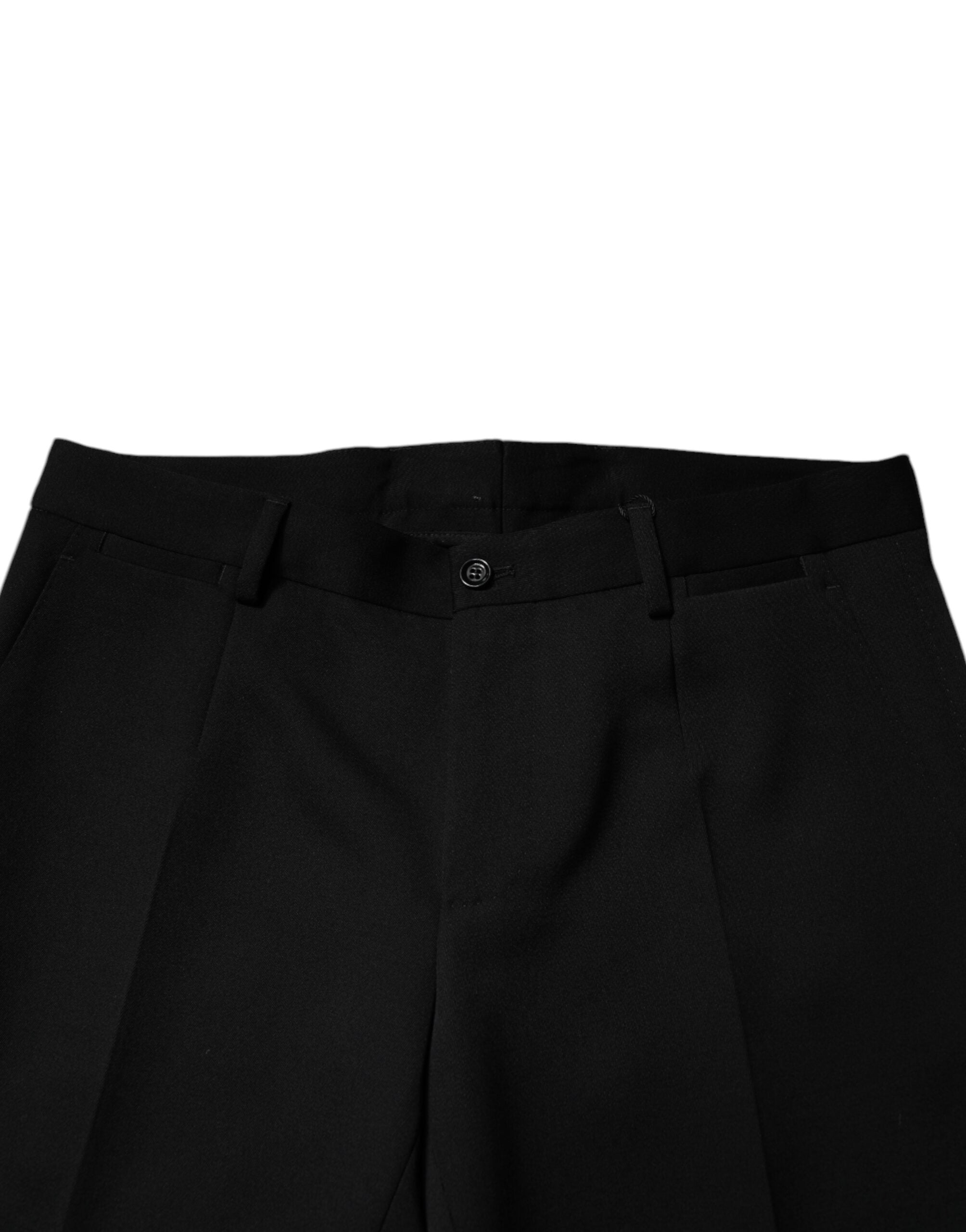 Pantalons de costume noirs en laine Dolce & Gabbana, coupe tapered, pour homme, détails élégants et finition soignée.