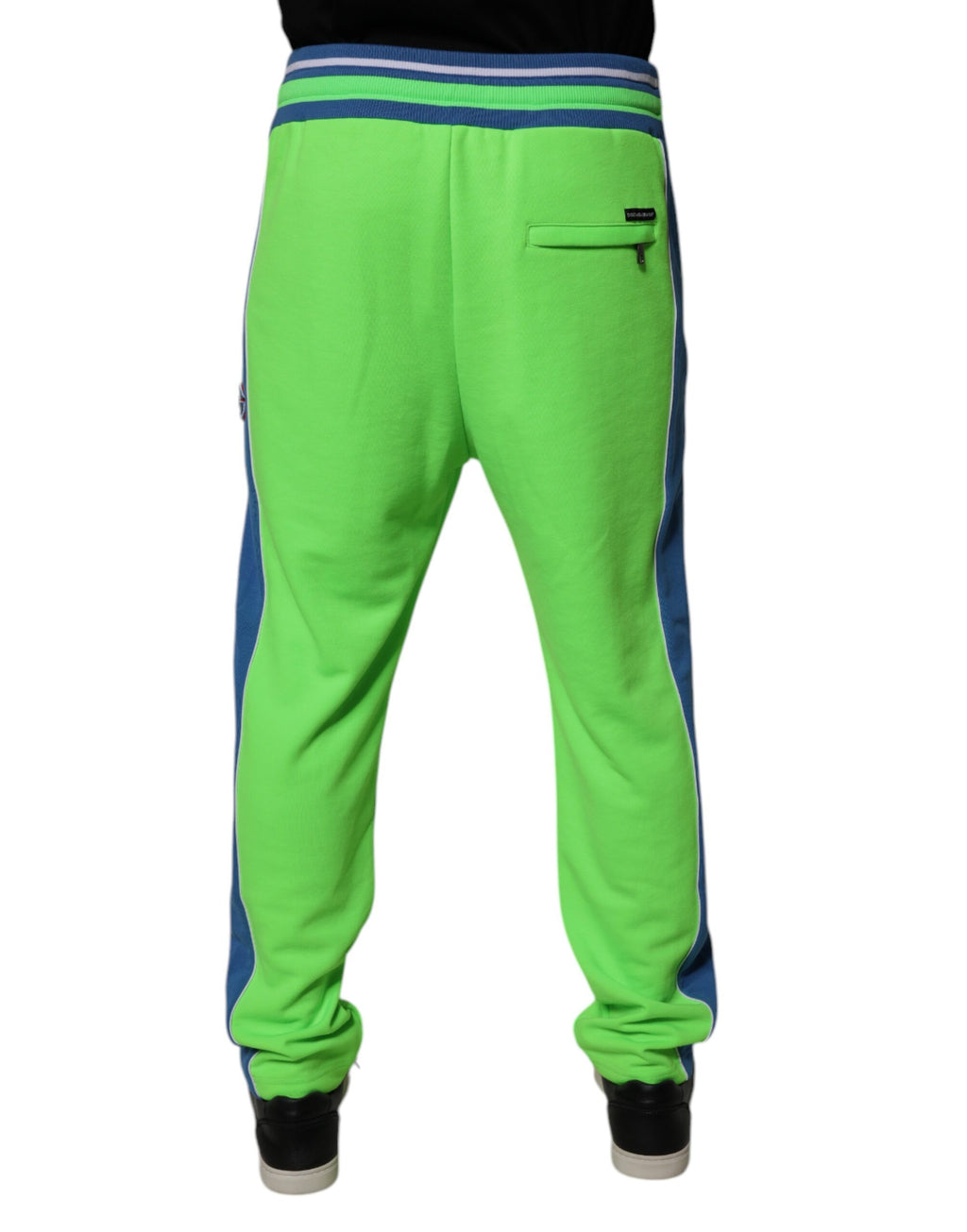 Pantalon de jogging Dolce & Gabbana vert et bleu, pantalon décontracté en coton avec logo de la marque visible.