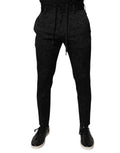 Pantalon skinny noir en brocart polyester de Dolce & Gabbana, coupe élégante avec détails sophistiqués.