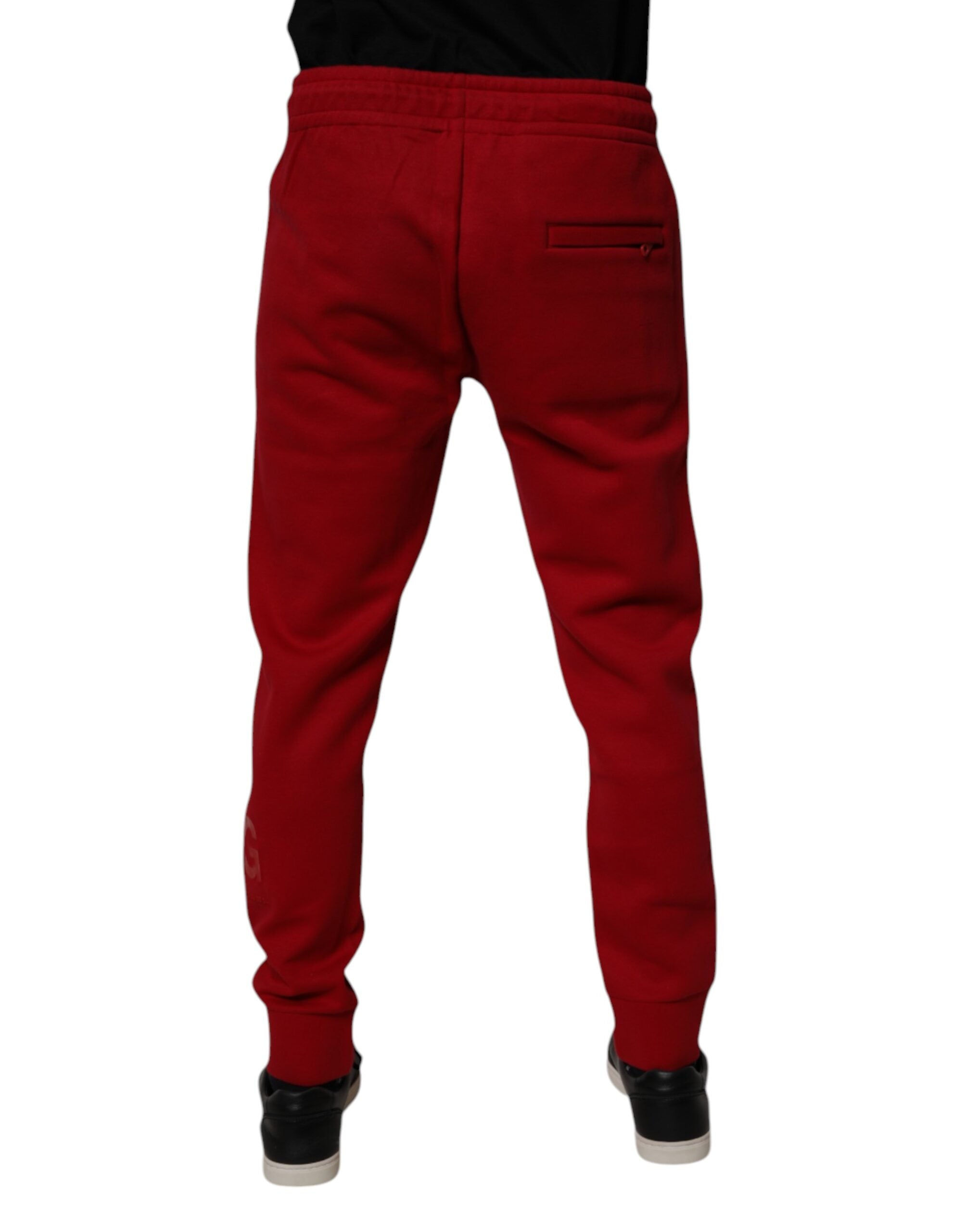 Pantalon de jogging en coton rouge Dolce & Gabbana avec logo DG, style décontracté pour homme.