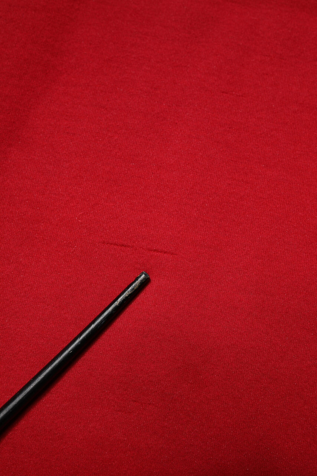 Pantalon de jogging homme Dolce & Gabbana en coton rouge avec logo DG, style décontracté et confortable.